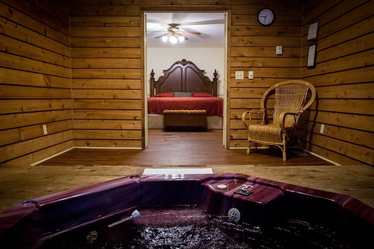View of a king bedroom from the hot tub