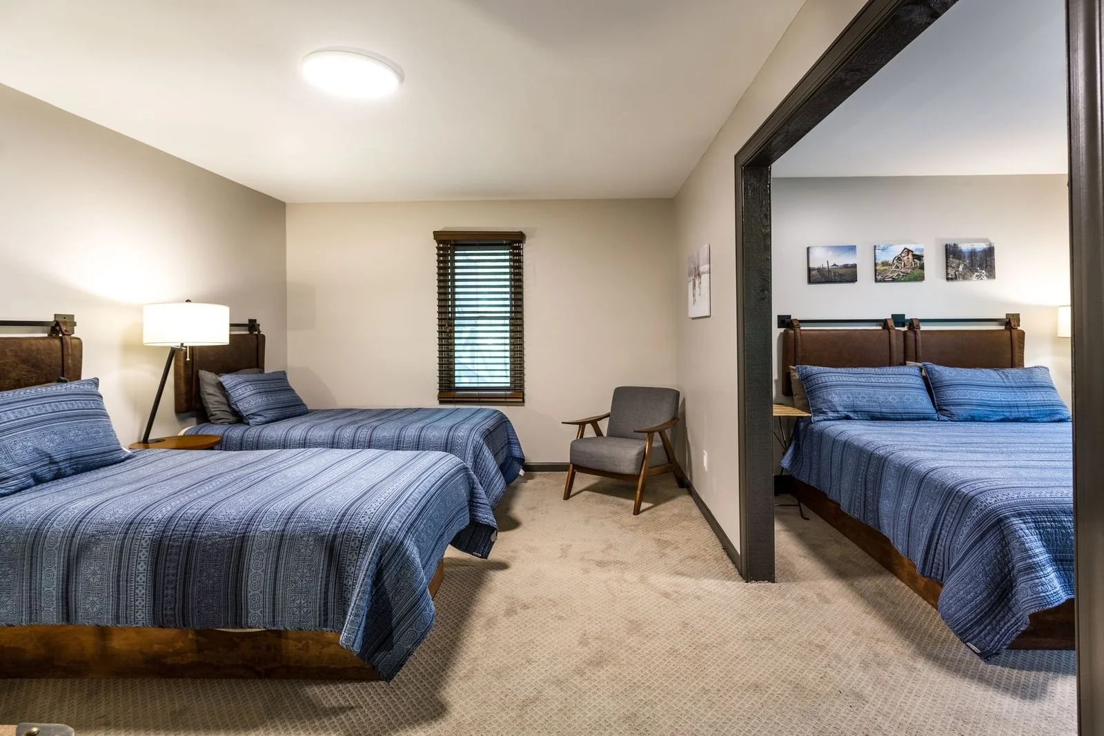 8 of the 16 rooms have this layout with 2 twin beds, 1 king bed, TV, desk & chair & balcony