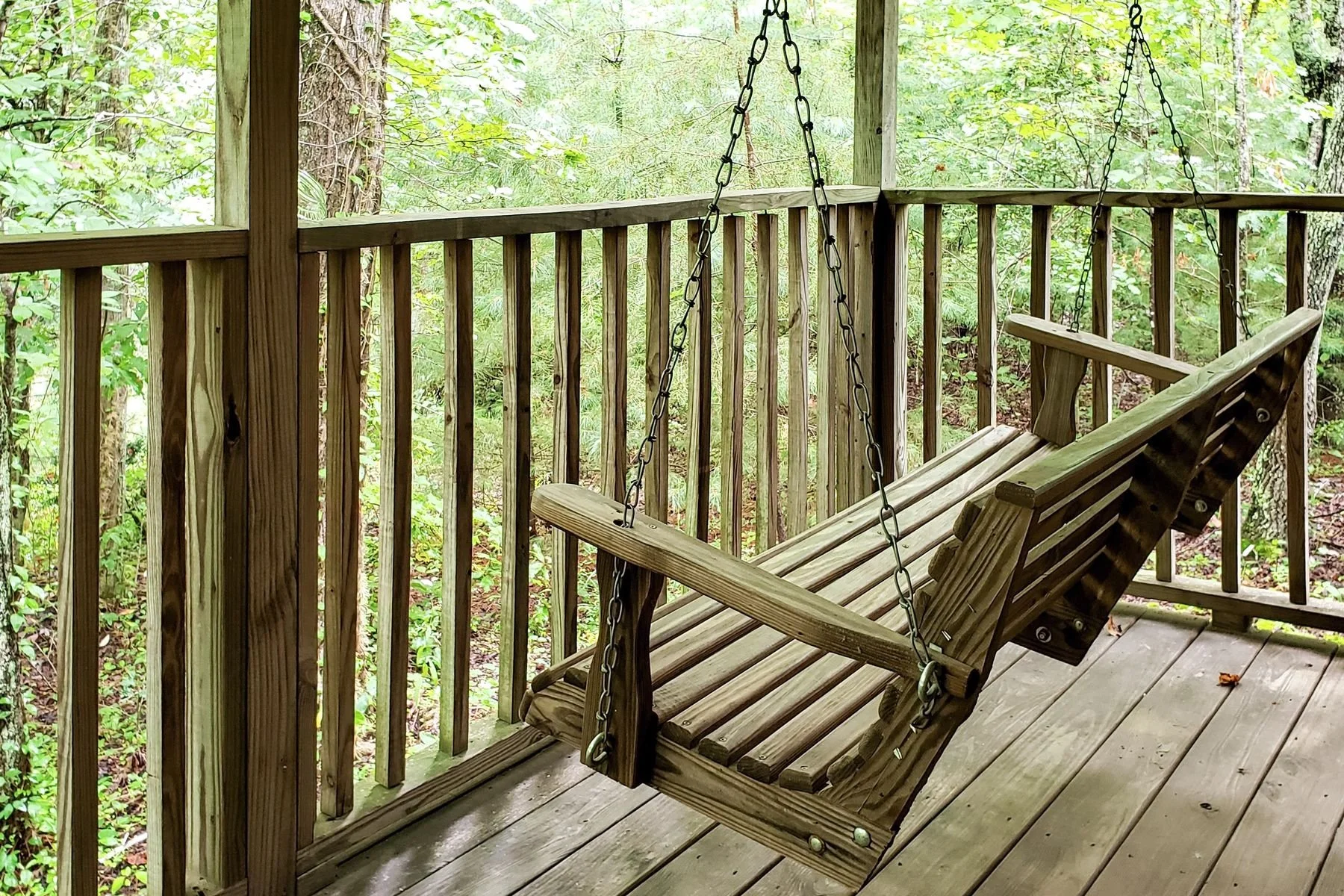 deluxe-cabin-wooded-porch-swing-north-georgia.jpg