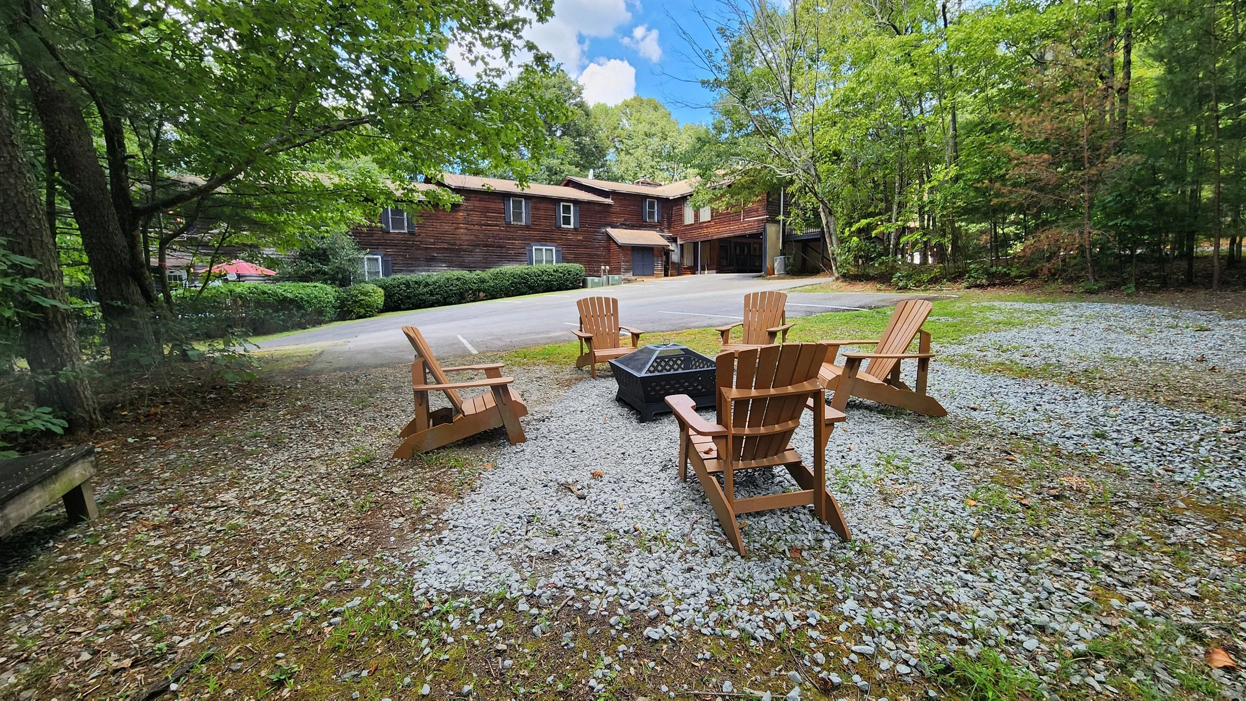 Fire pit with Mountain Laurel Inn in the background