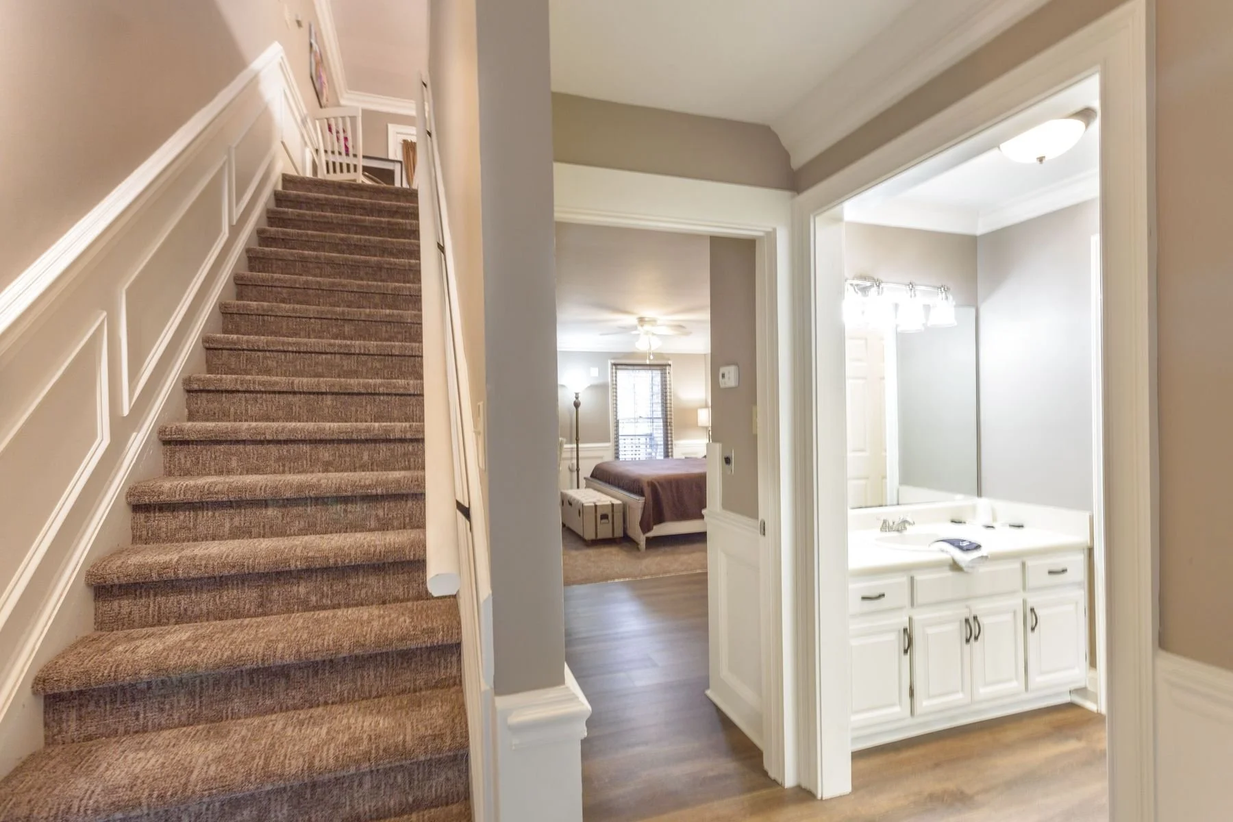 Stairs Leading to 2nd Level - A Peak at the Master Bedroom - Bathroom to the Right