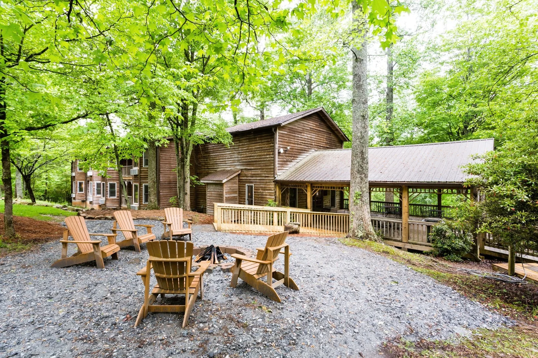Exterior fire pit and walkway of the allergy-friendly Treetopper Lodge nestled in the North Georgia mountains