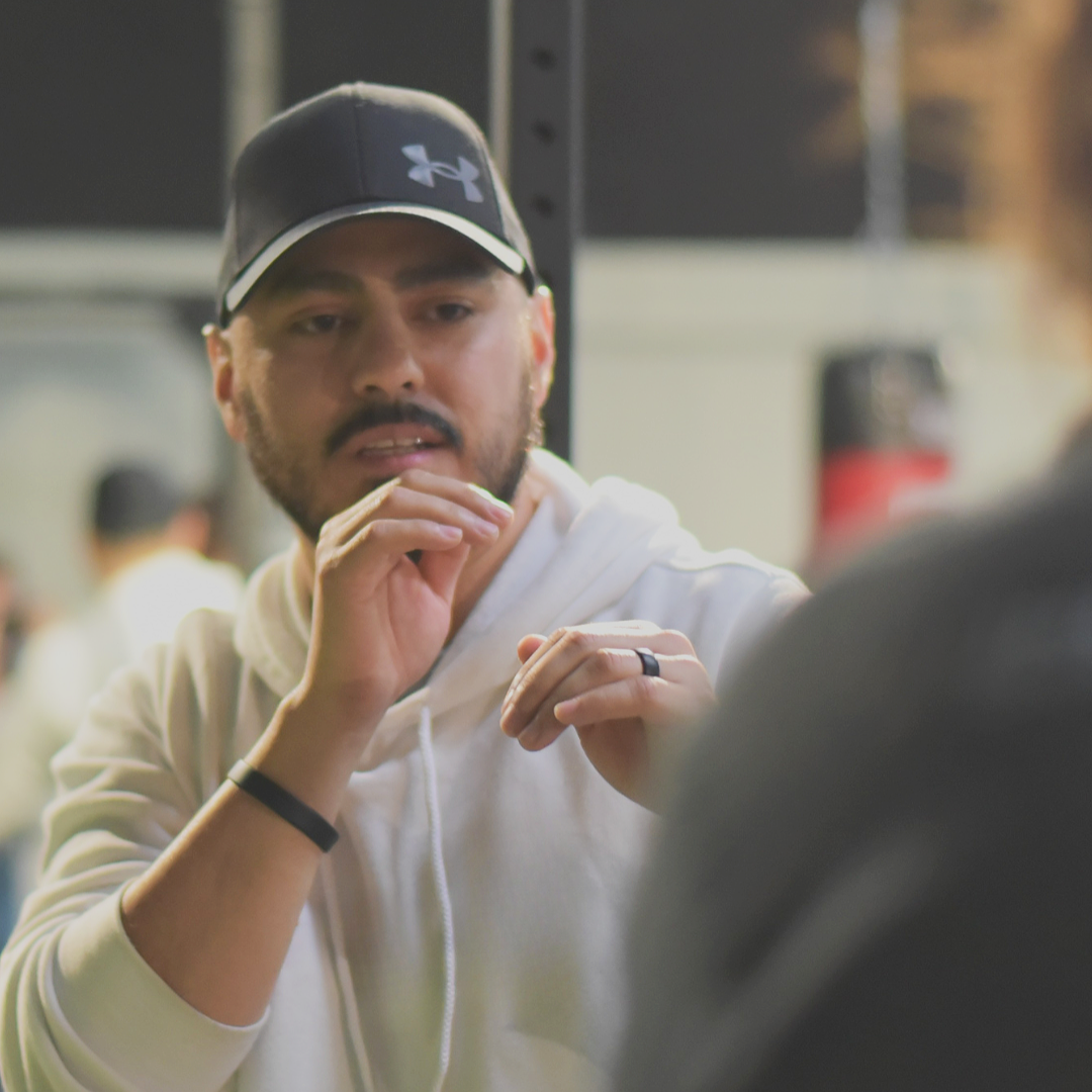 Coach Daniel coaching a boxer