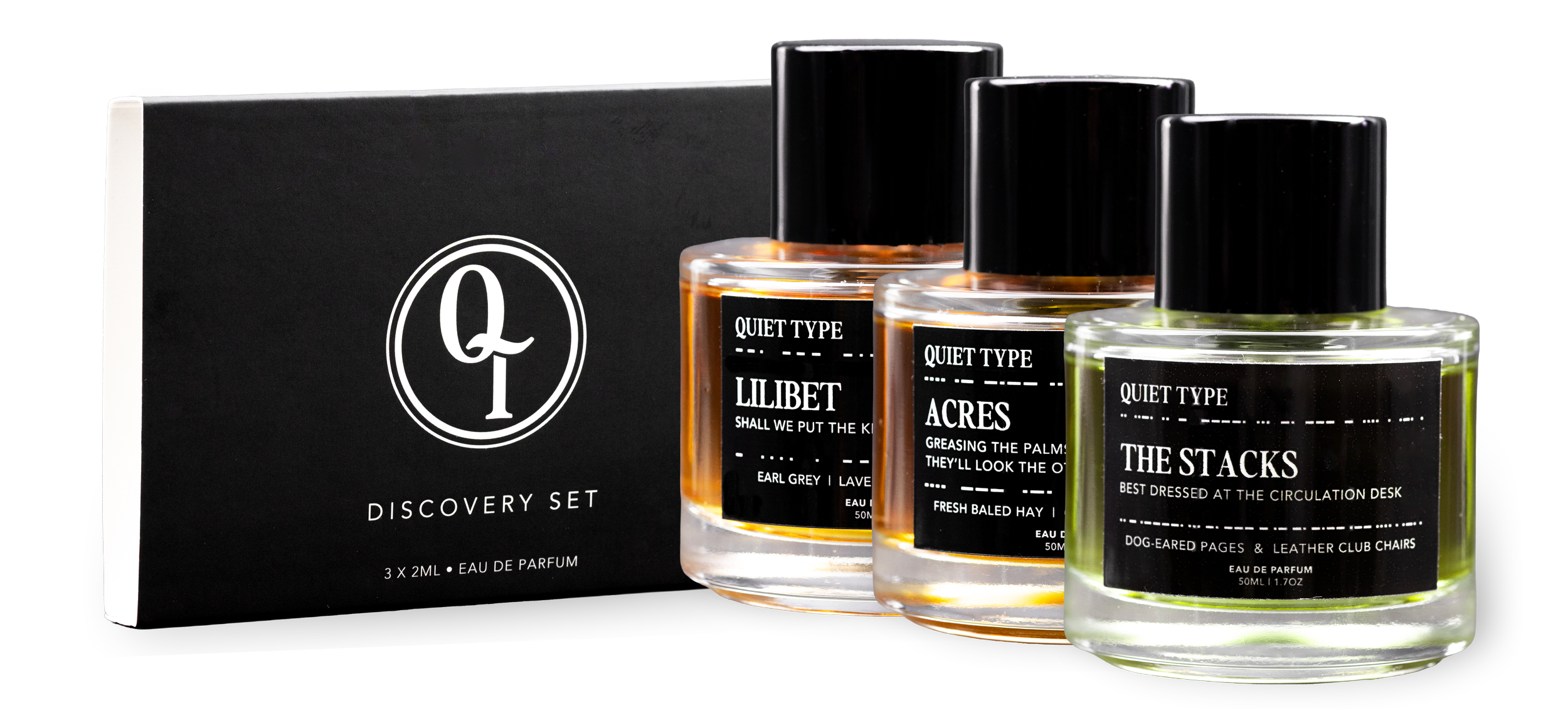 Set of three Quiet Type Fragrances' perfume bottles labeled 'Lilibet,' 'Acres,' and 'The Stacks' in front of their black Discovery Set.