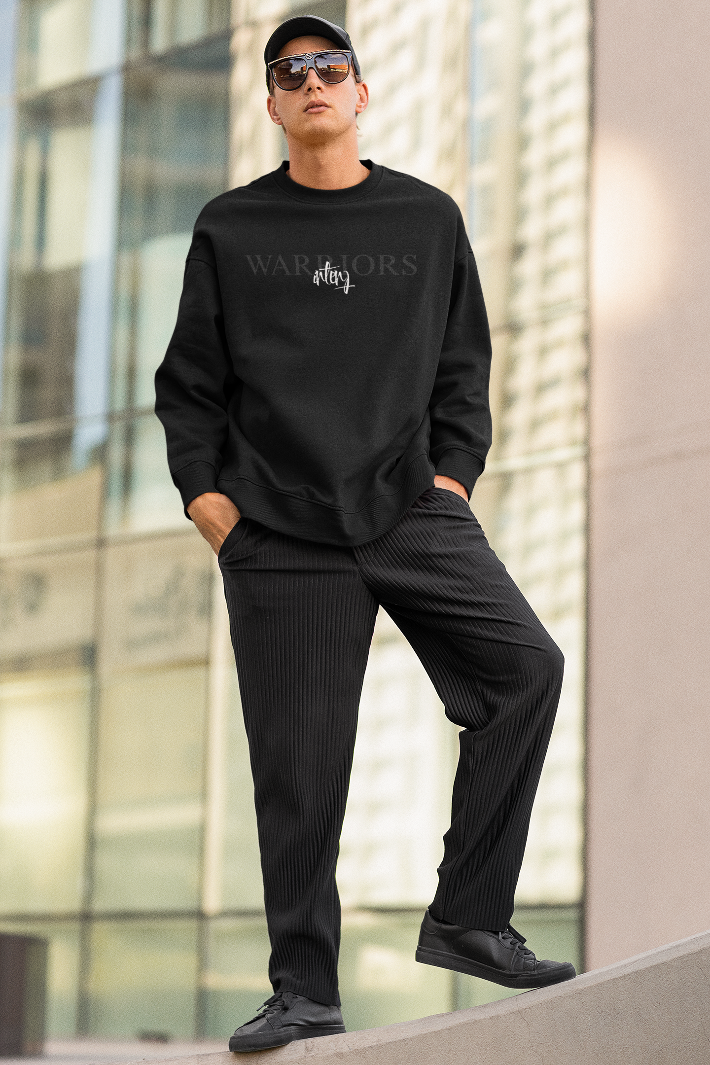 mockup-of-a-cool-man-with-sunglasses-wearing-an-oversized-sweatshirt-in-the-city-m25282.png