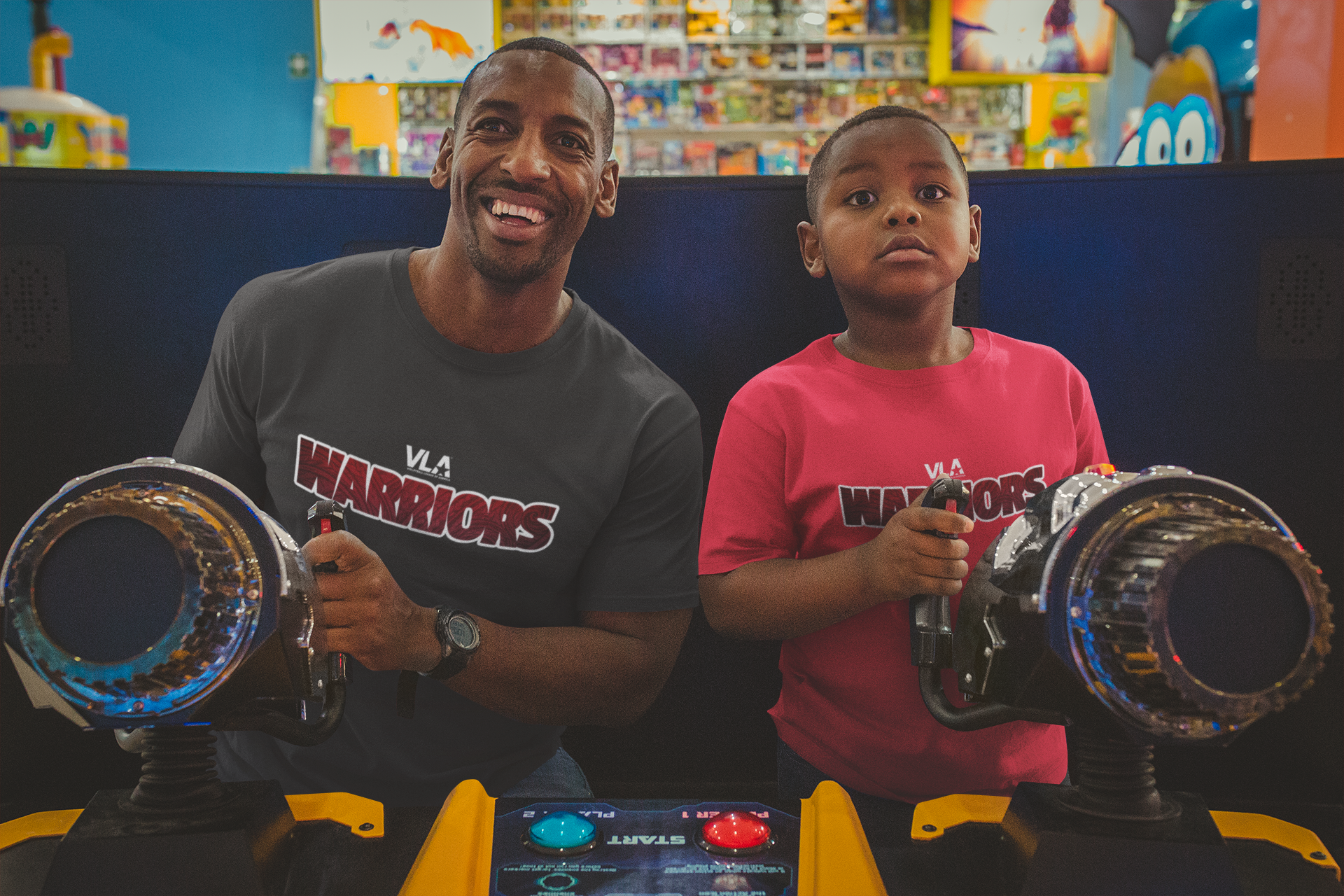 t-shirt-mockup-of-a-father-and-son-playing-at-the-arcade-a20538.png