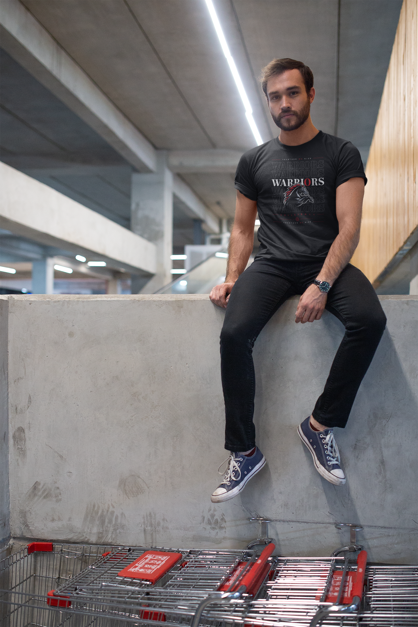 t-shirt-mockup-of-a-man-sitting-on-a-cement-wall-20053.png