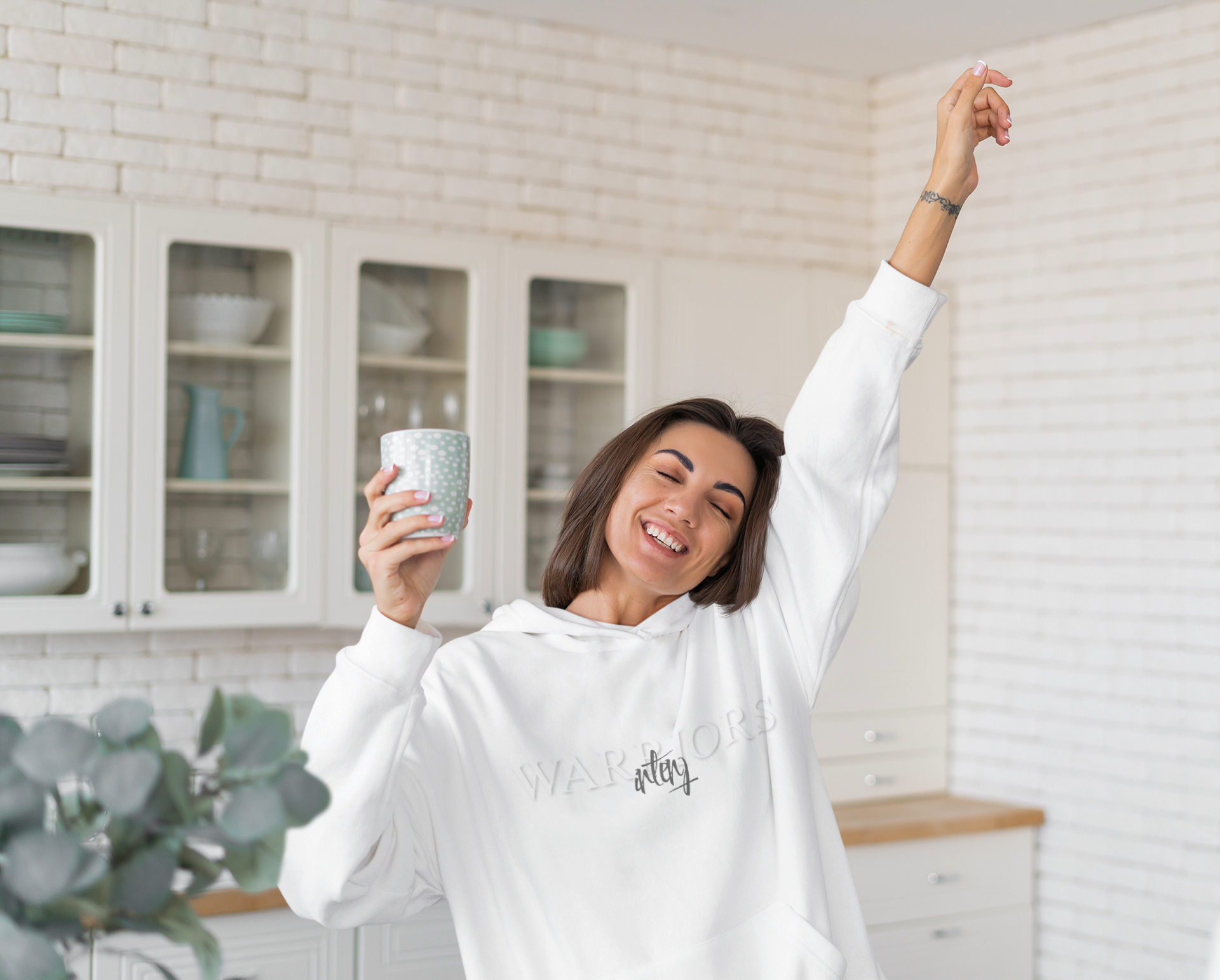 hoodie-mockup-featuring-a-happy-woman-posing-with-a-cup-of-coffee-m18994-r-el2.png