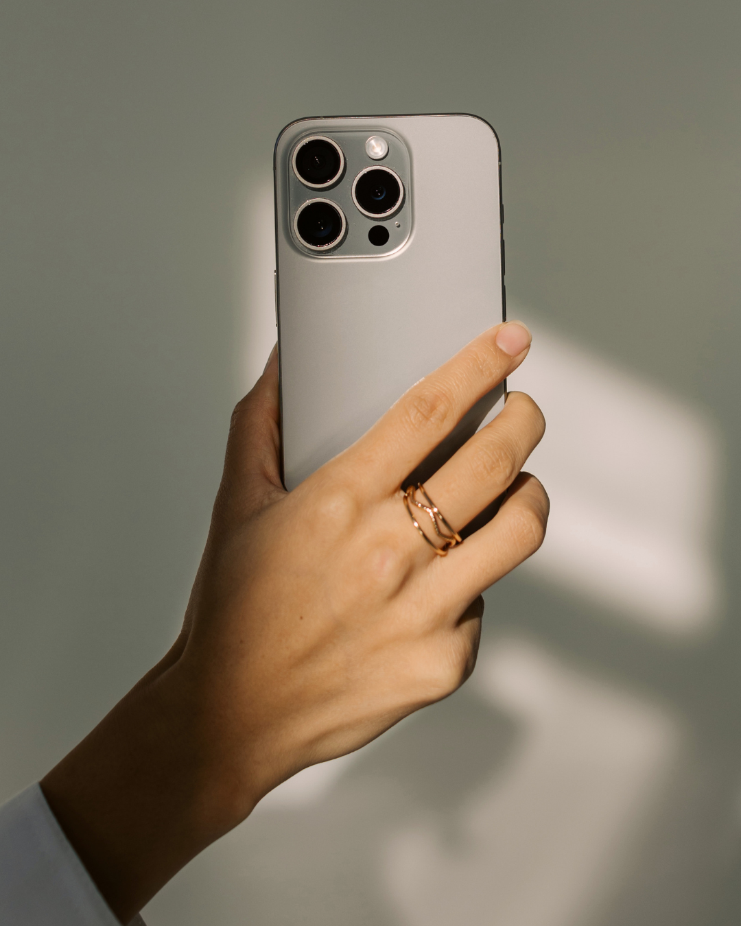 Smartphone used for social media content creation and digital marketing.