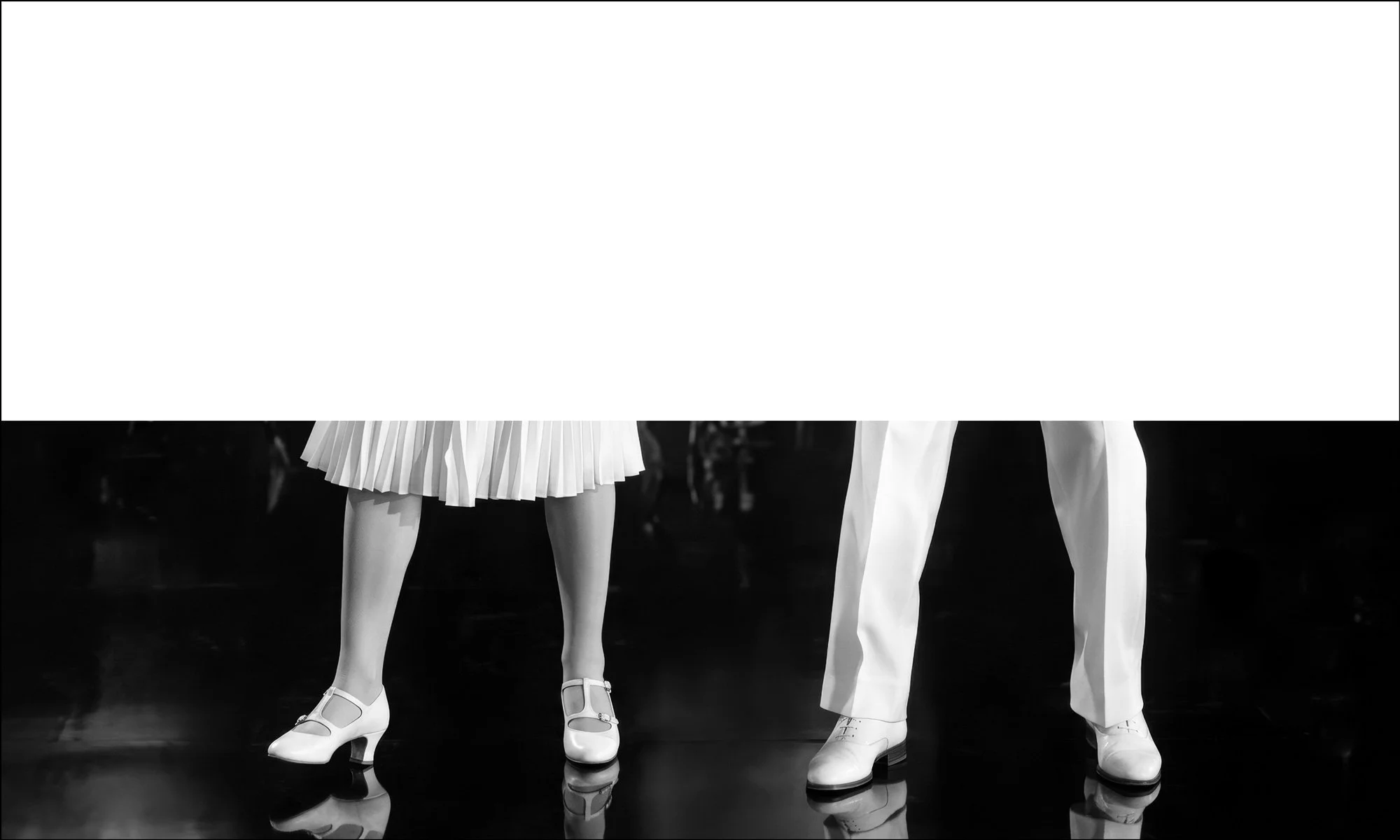 Neal Spector archival print featuring a negative white space above a vintage couple's dancing feet