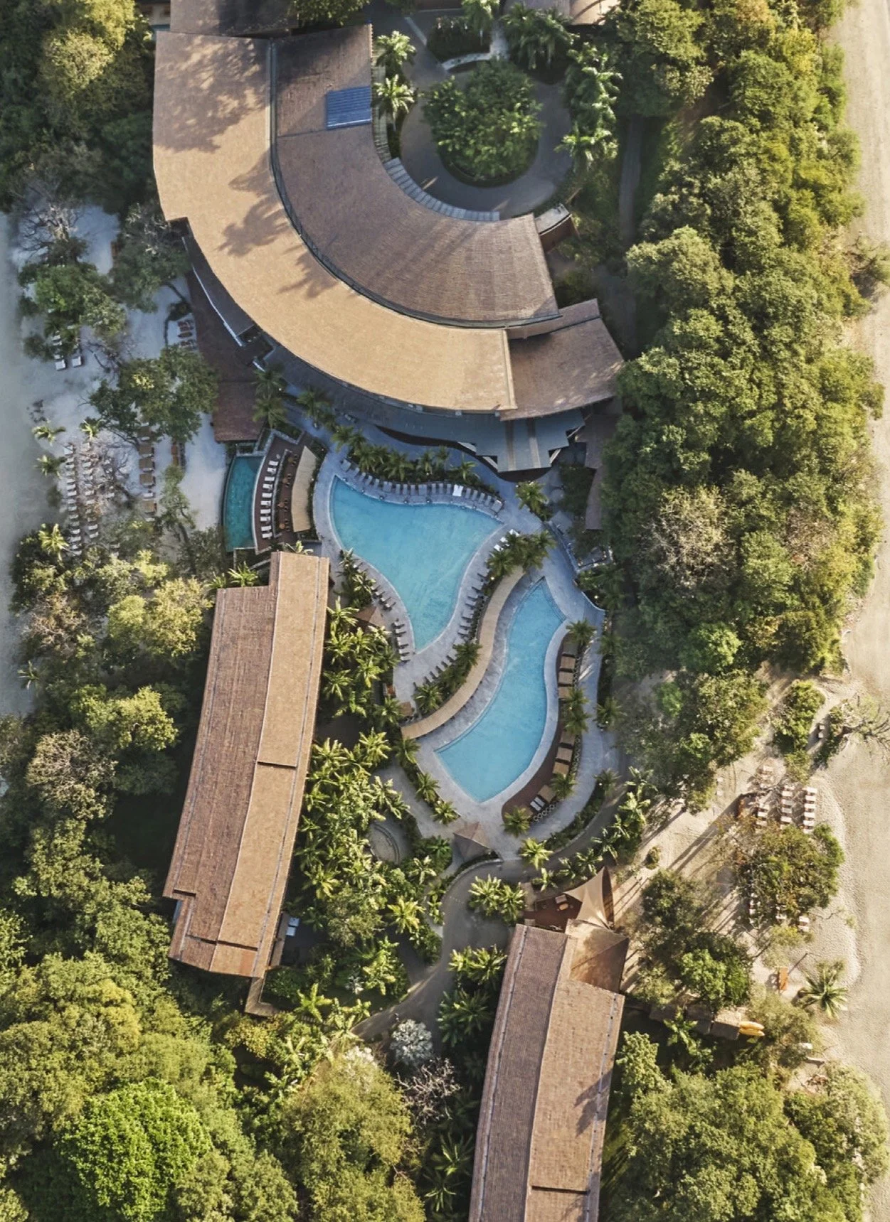 Top view of Costa Rica resort with lodging and pool. Sourced from Four Seasons in Costa Rica.