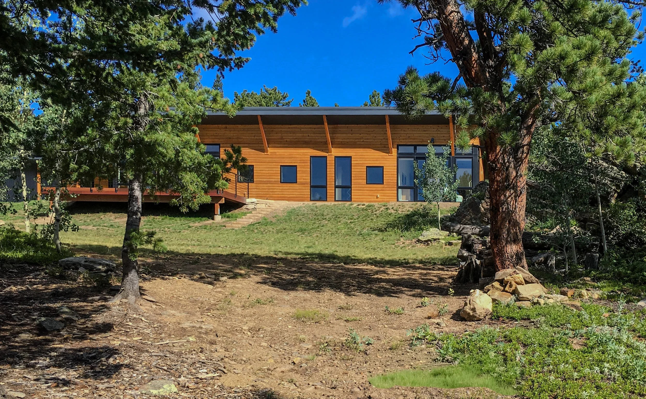 BEASLEY ARCHITECTURE AND DESIGN - JAMES BEASLEY ARCHITECT - BaaD - midcentury modern - mountain architecture -Corner glass - passive solar - HUMAN ARCHITECTURE - Boulder - Nederland - Colorado -  off the grid  - CUSTOM residential architecture - mode