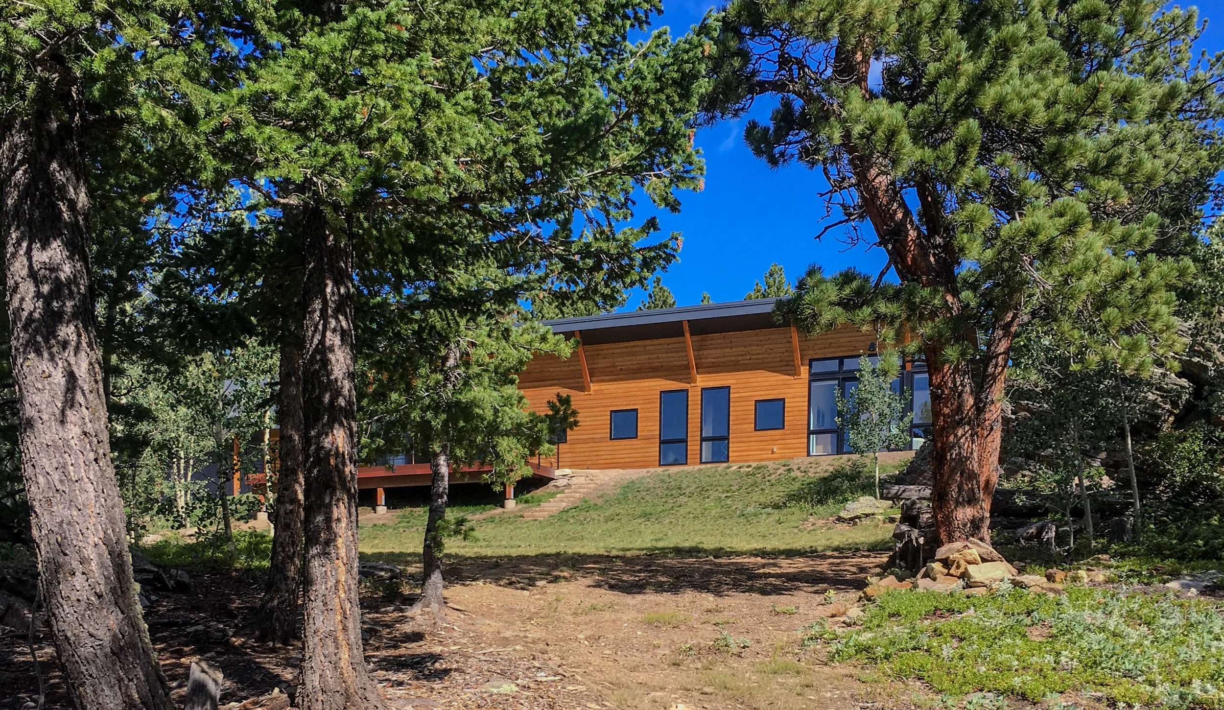 BEASLEY ARCHITECTURE AND DESIGN - JAMES BEASLEY ARCHITECT - BaaD - midcentury modern - mountain architecture -Corner glass - passive solar - HUMAN ARCHITECTURE - Boulder - Nederland - Colorado -  off the grid  - CUSTOM residential architecture - mode