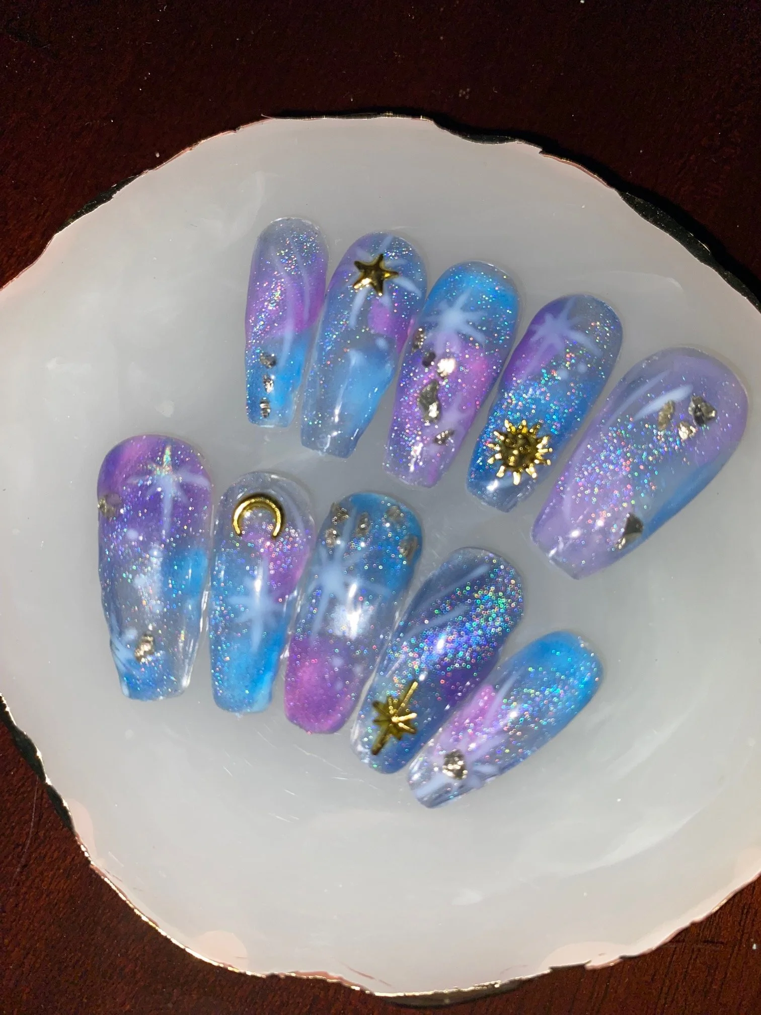 Extra Detail: celestial-inspired shimmers and gems
