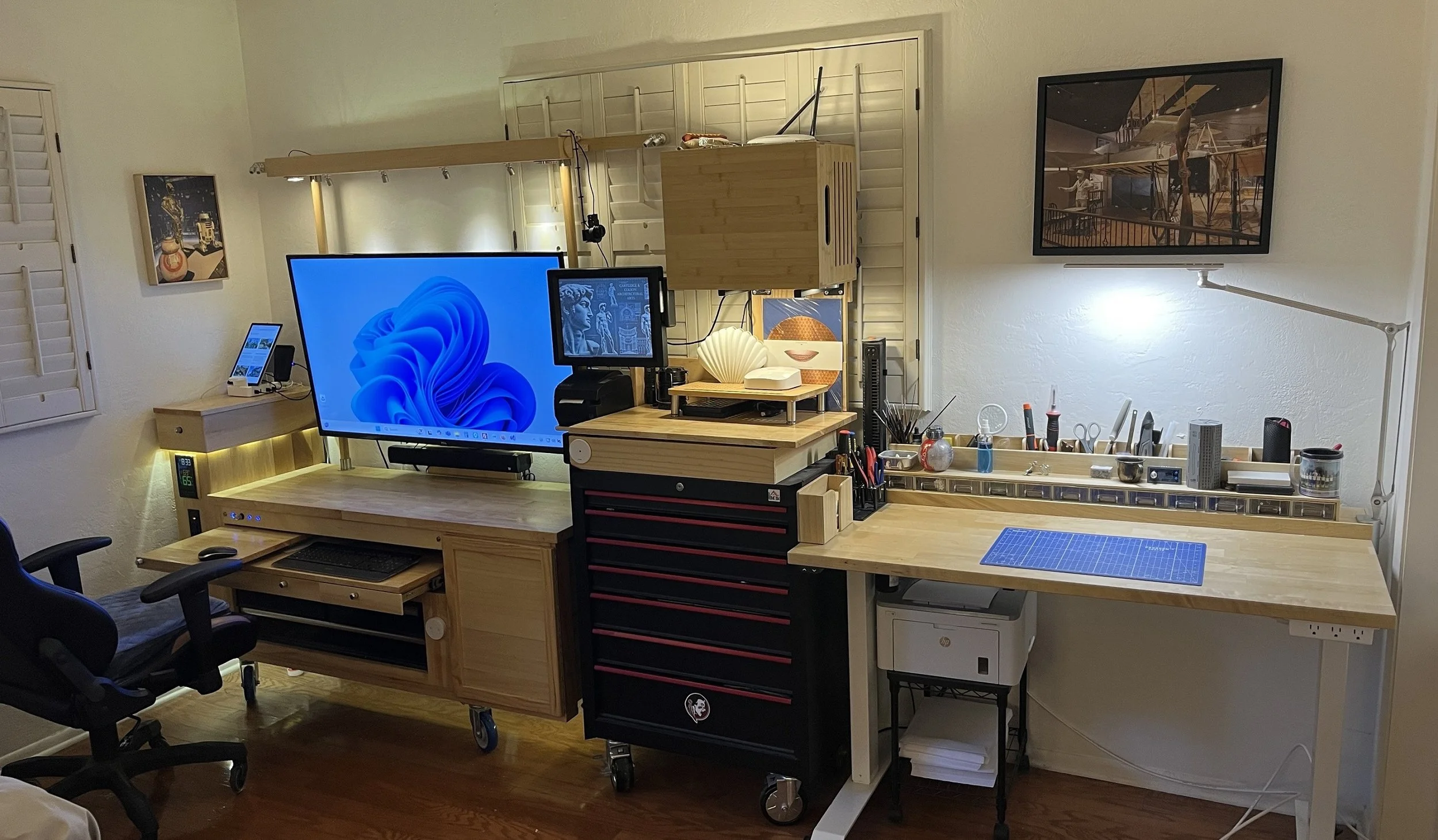 Custom home office and creative workspace with organized workstations