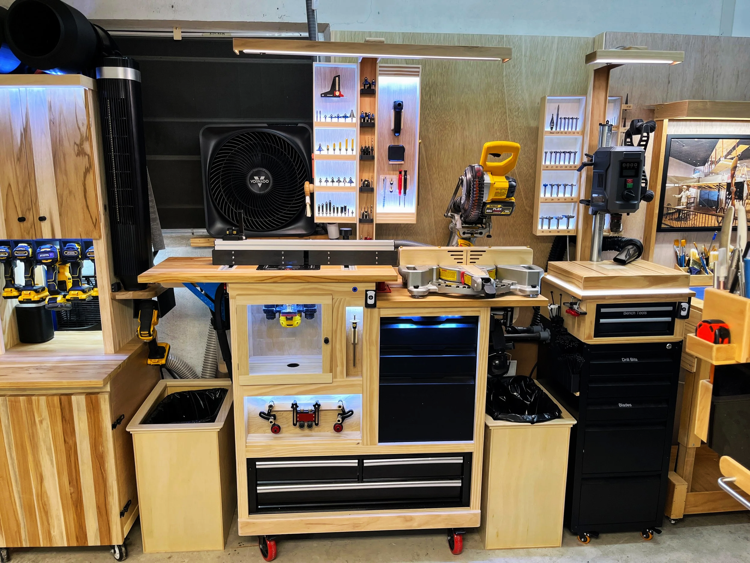 Miter saw station with built in router table and backlit tool storage
