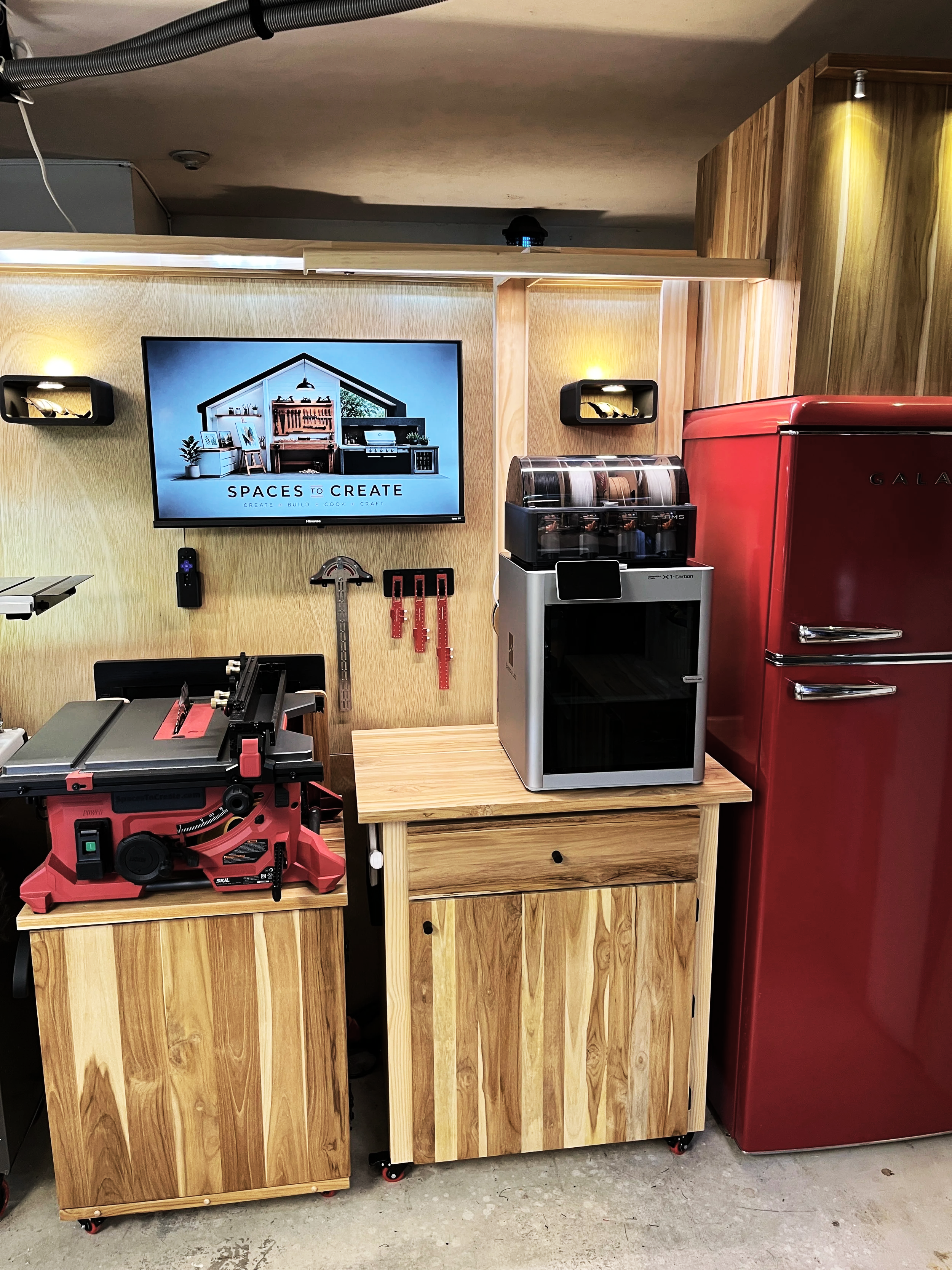 Custom modular woodworking workstations with integrated tool storage, spaces to create logo and Bambu Labs X1 Carbon 3D printer