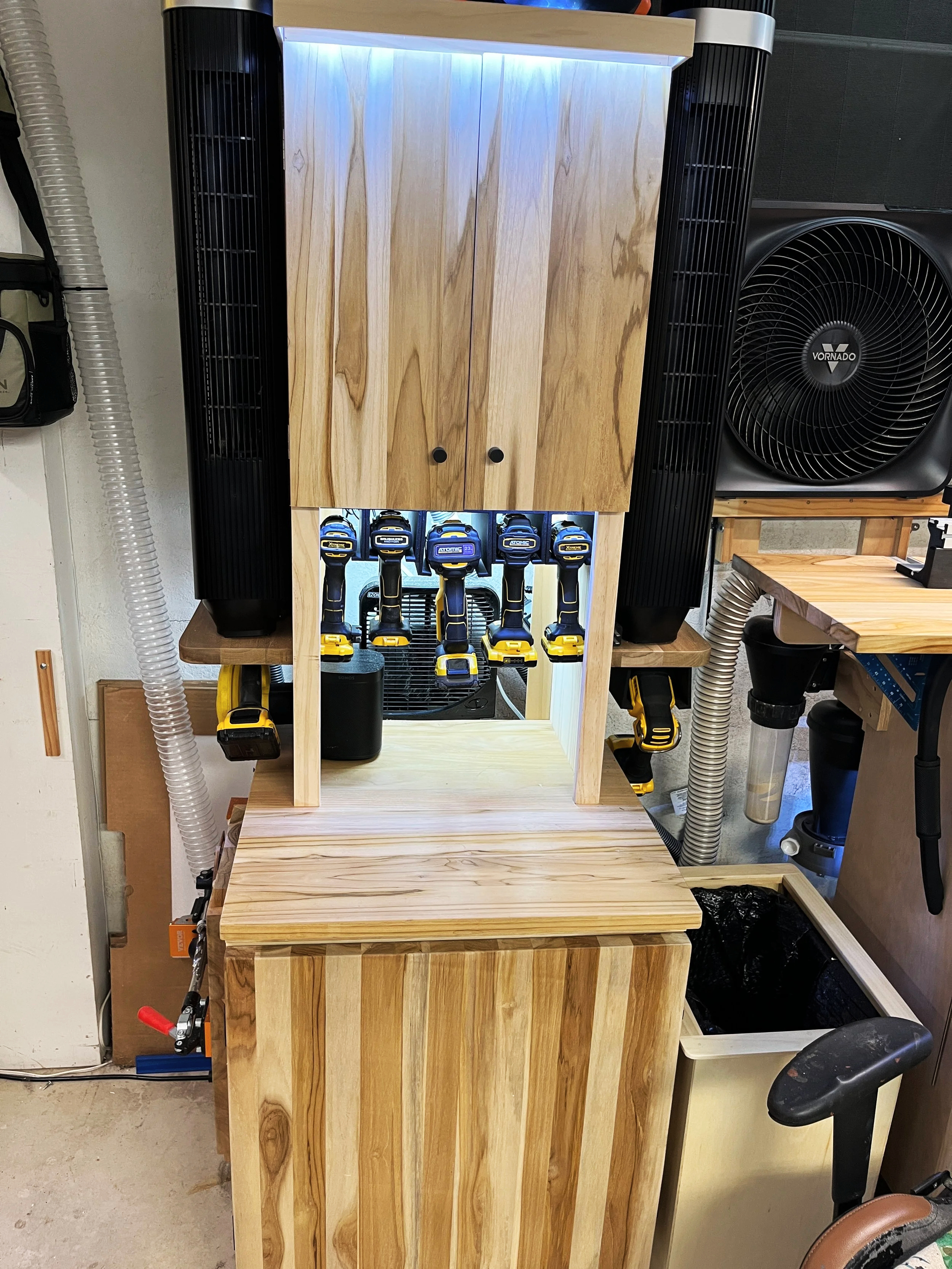 Custom dust collector silencer cabinet for a home woodworking shop