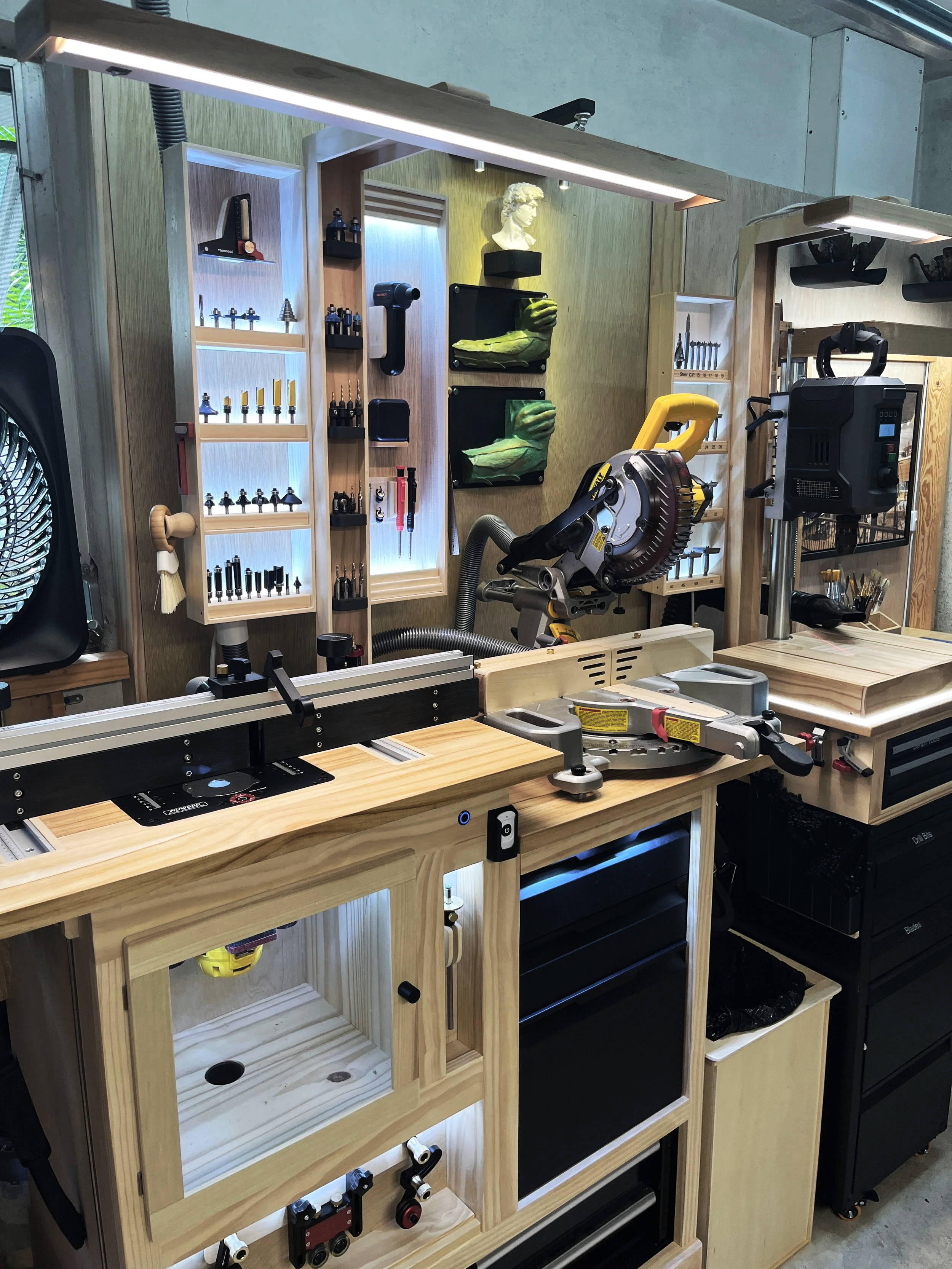 Long view of modular woodworking workstations with organized tool storage