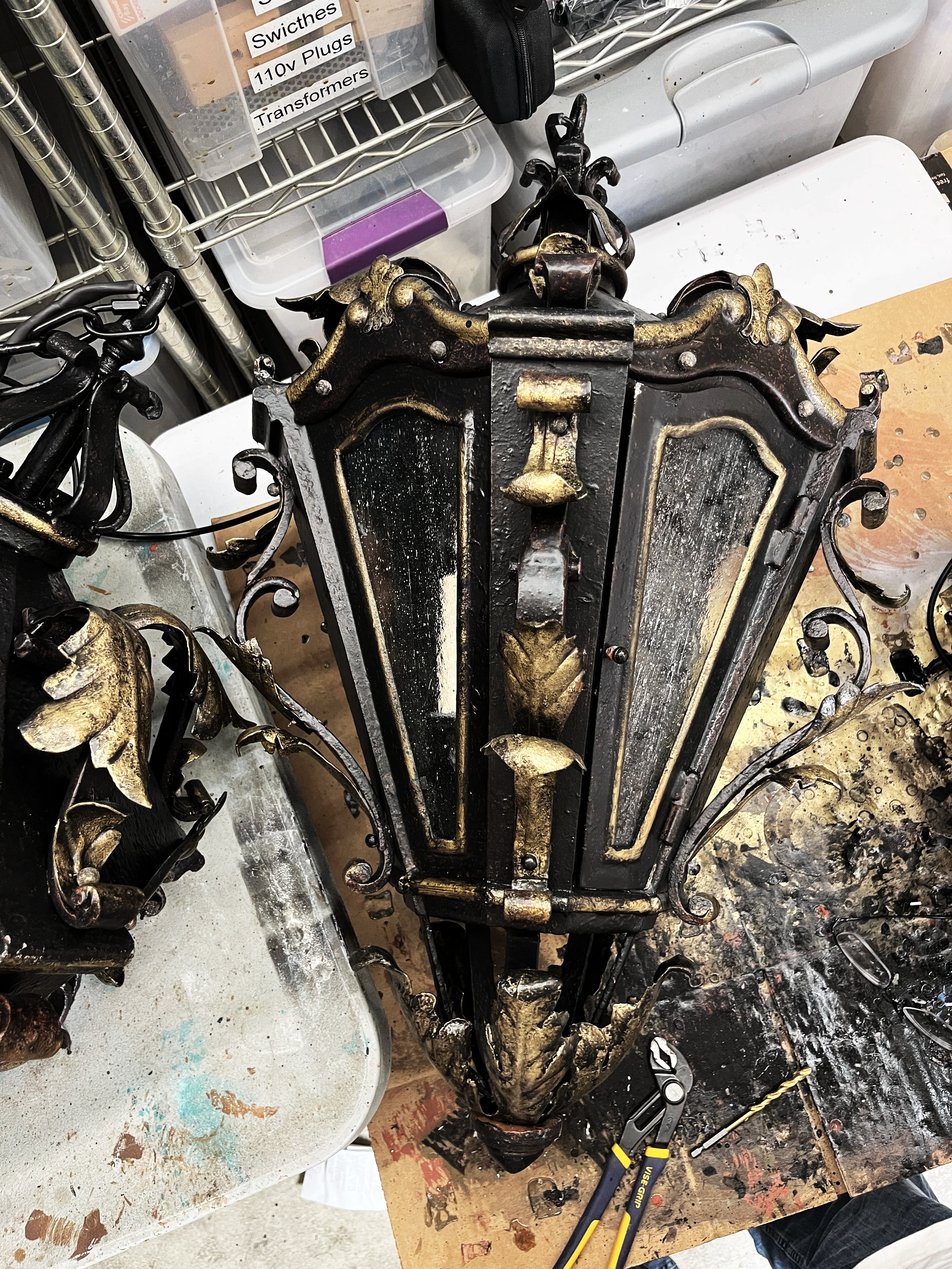 Restored outdoor architectural lanterns with refinished finish - Paul Ferrante