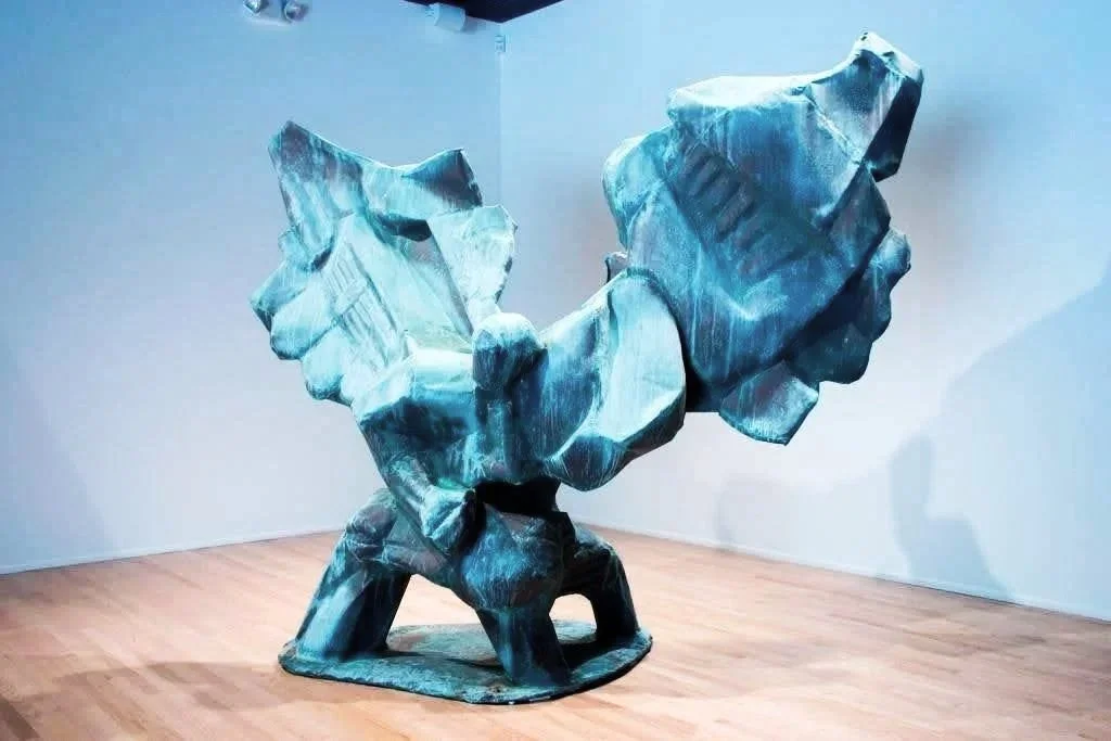 Michael the Archangel sculpture with restored patina finish
