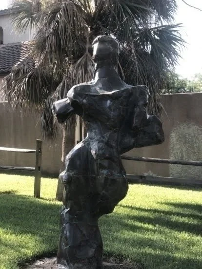 The Sentinel sculpture with restored patina finish