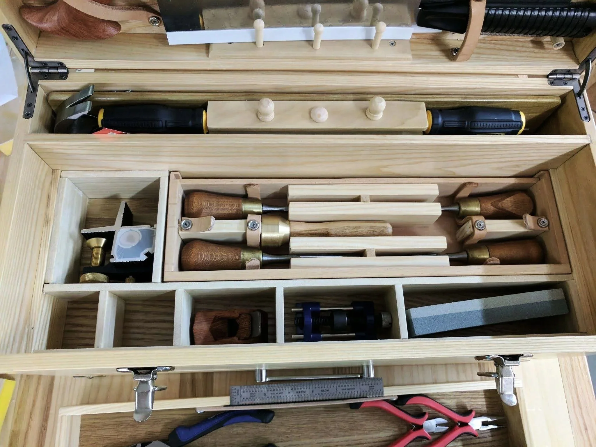Close-up of organized storage inside a custom hobby toolbox