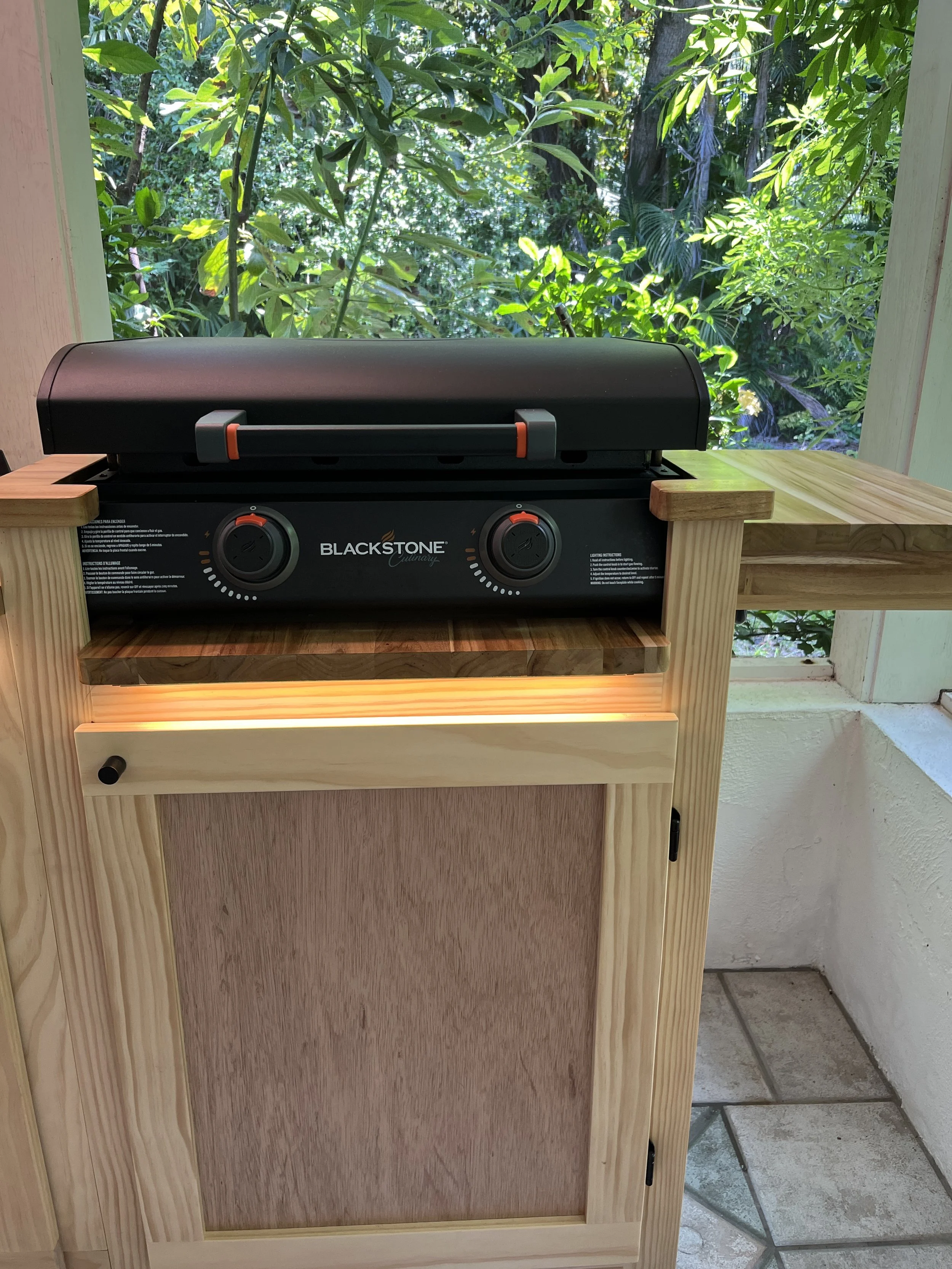 Built-in Blackstone griddle station in a custom modular outdoor kitchen