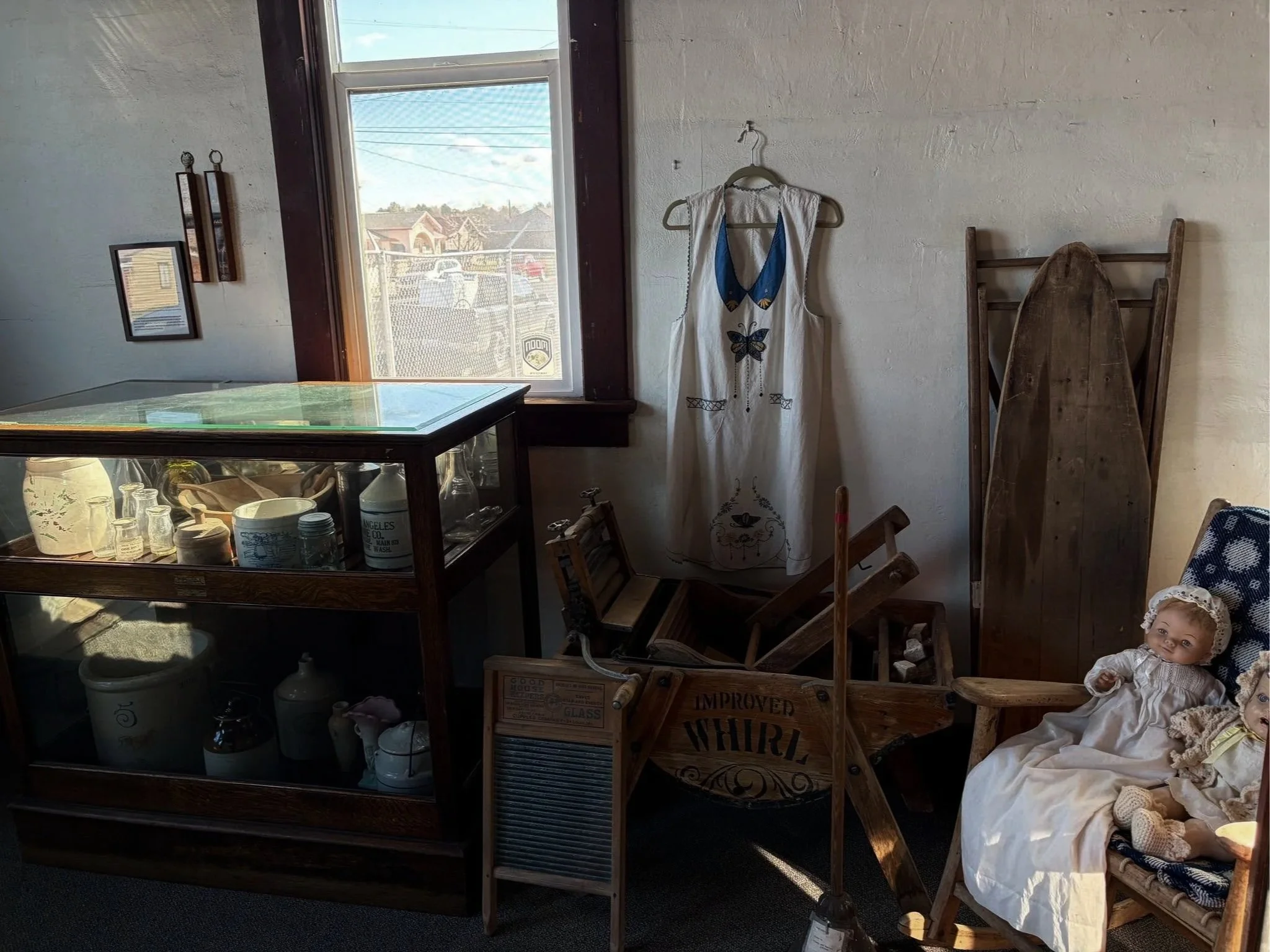 Image of museum display with antique household items