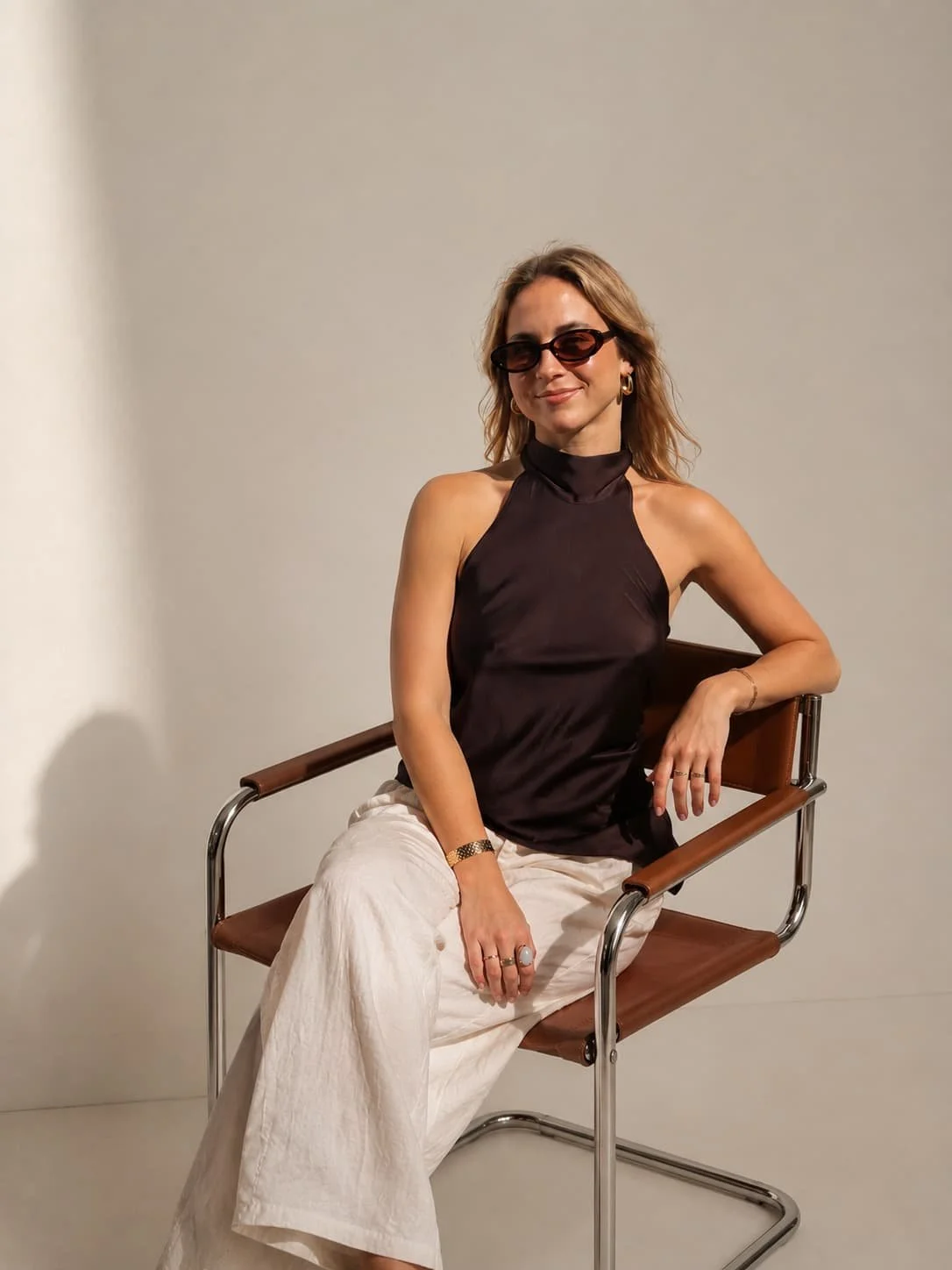 Headshot of Jess, co-founder, shot in a studio in professional attire
