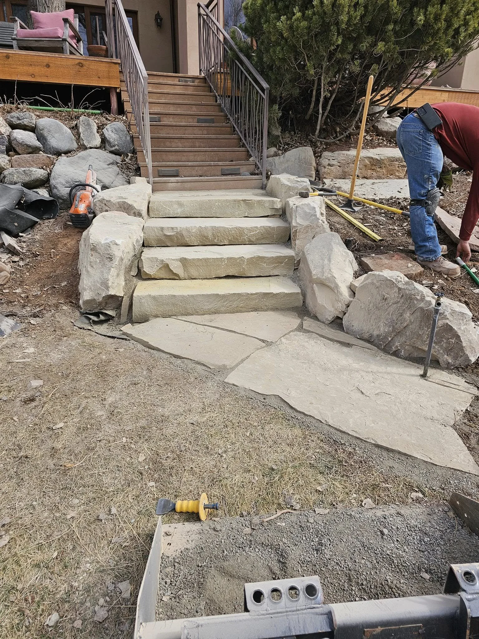 natural stone steps with boulders and flagstone