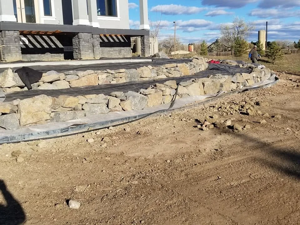 tiered hardscaping featuring natural stones