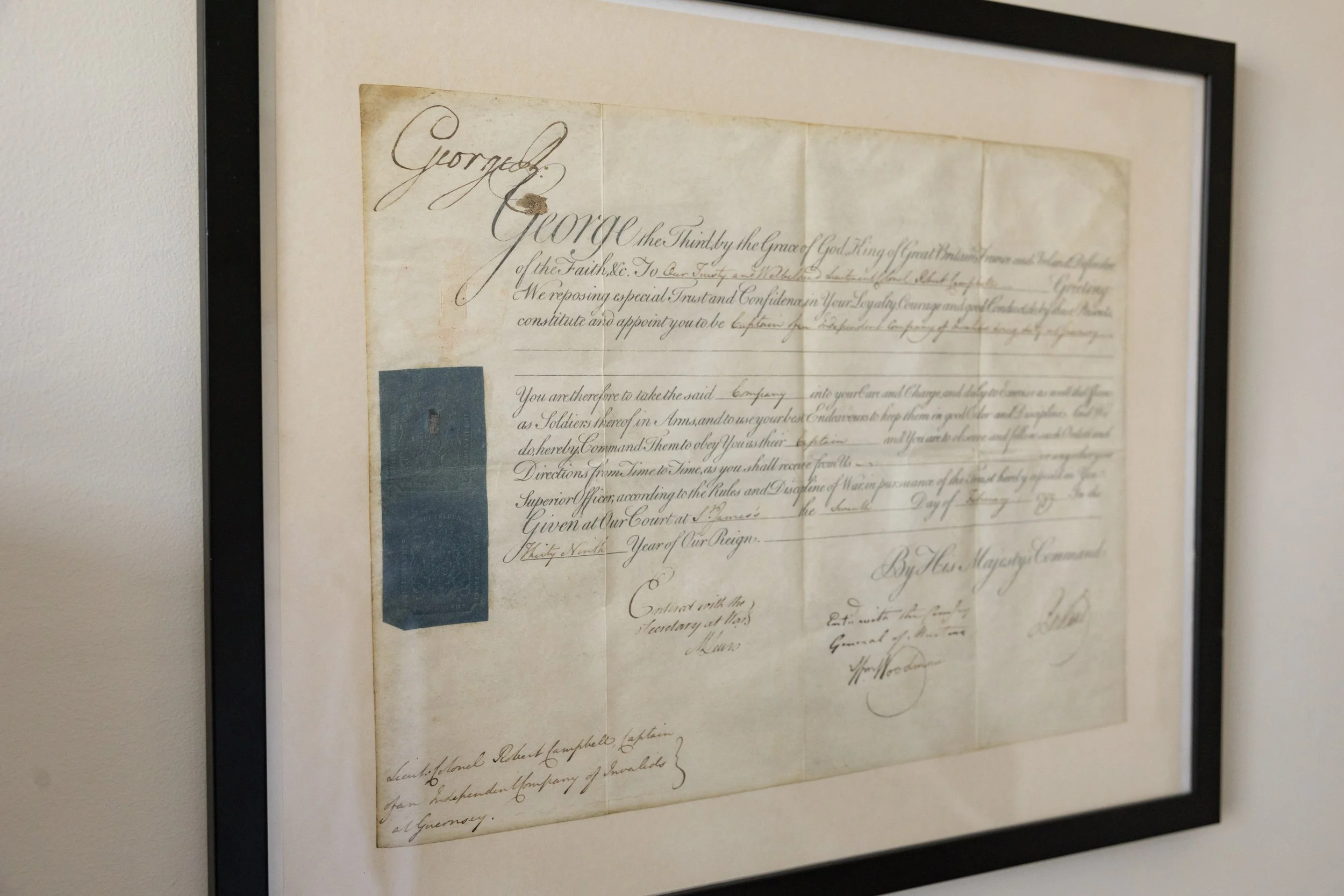 Angled view of the 1799 Royal Military Commission showing the blue embossed seal.