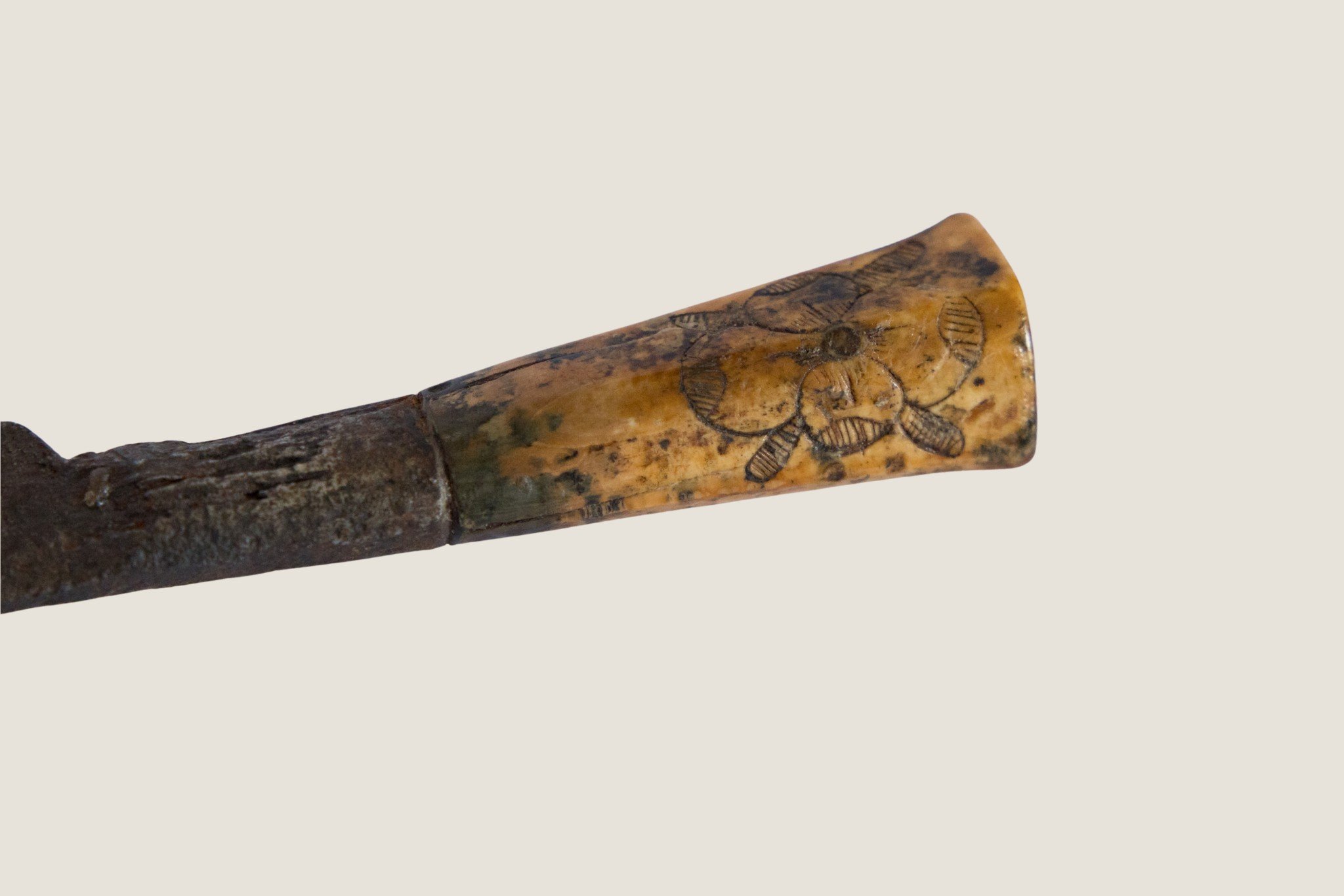 Close view of the decorated handle of the Stuart-period iron knife.