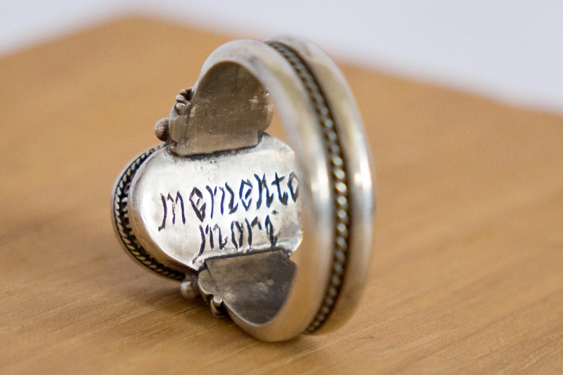Interior view of the Georgian silver memento mori ring showing the engraved inscription inside the band.