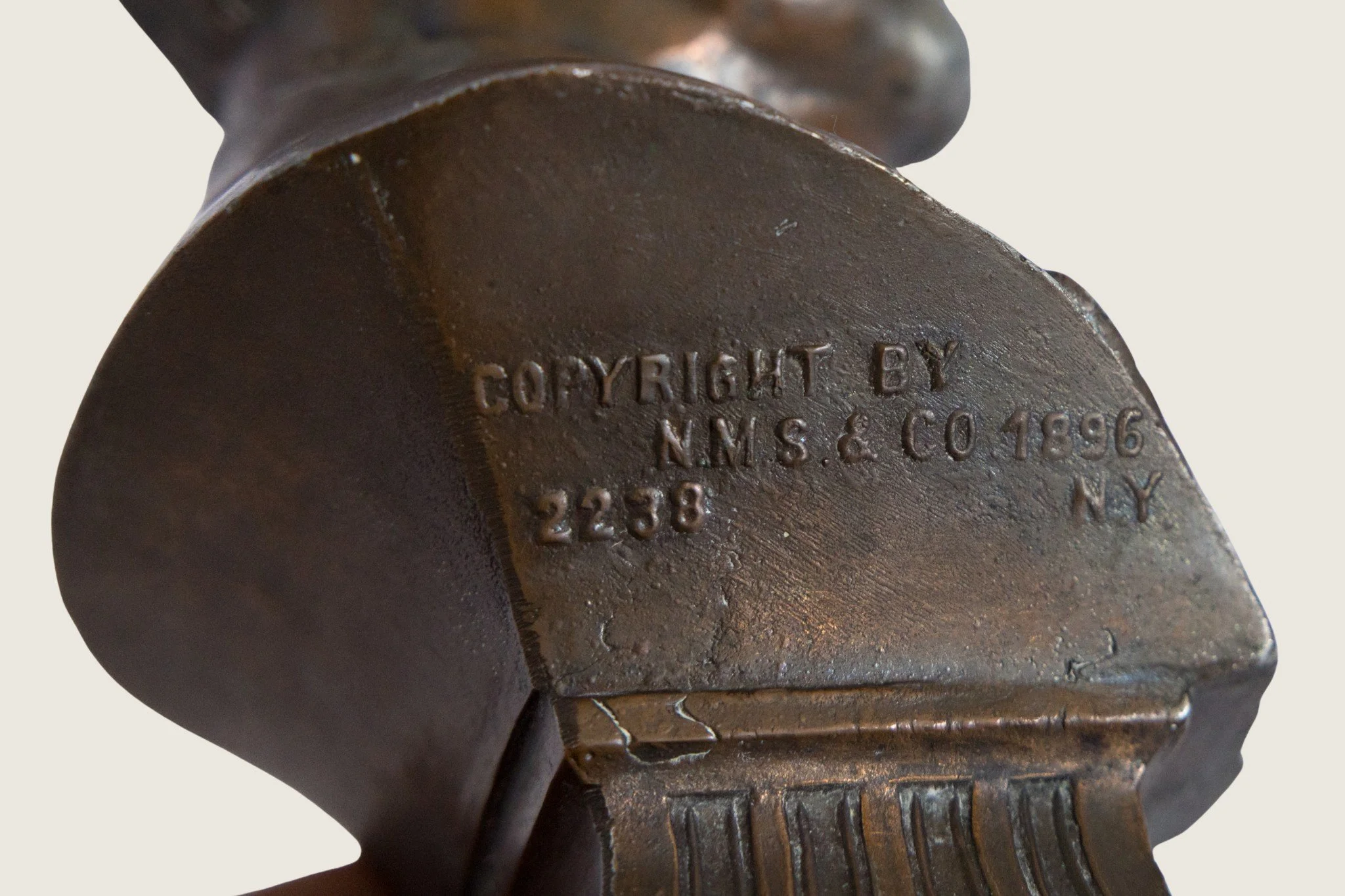 Close detail of the copyright marking on the William McKinley commemorative bust.