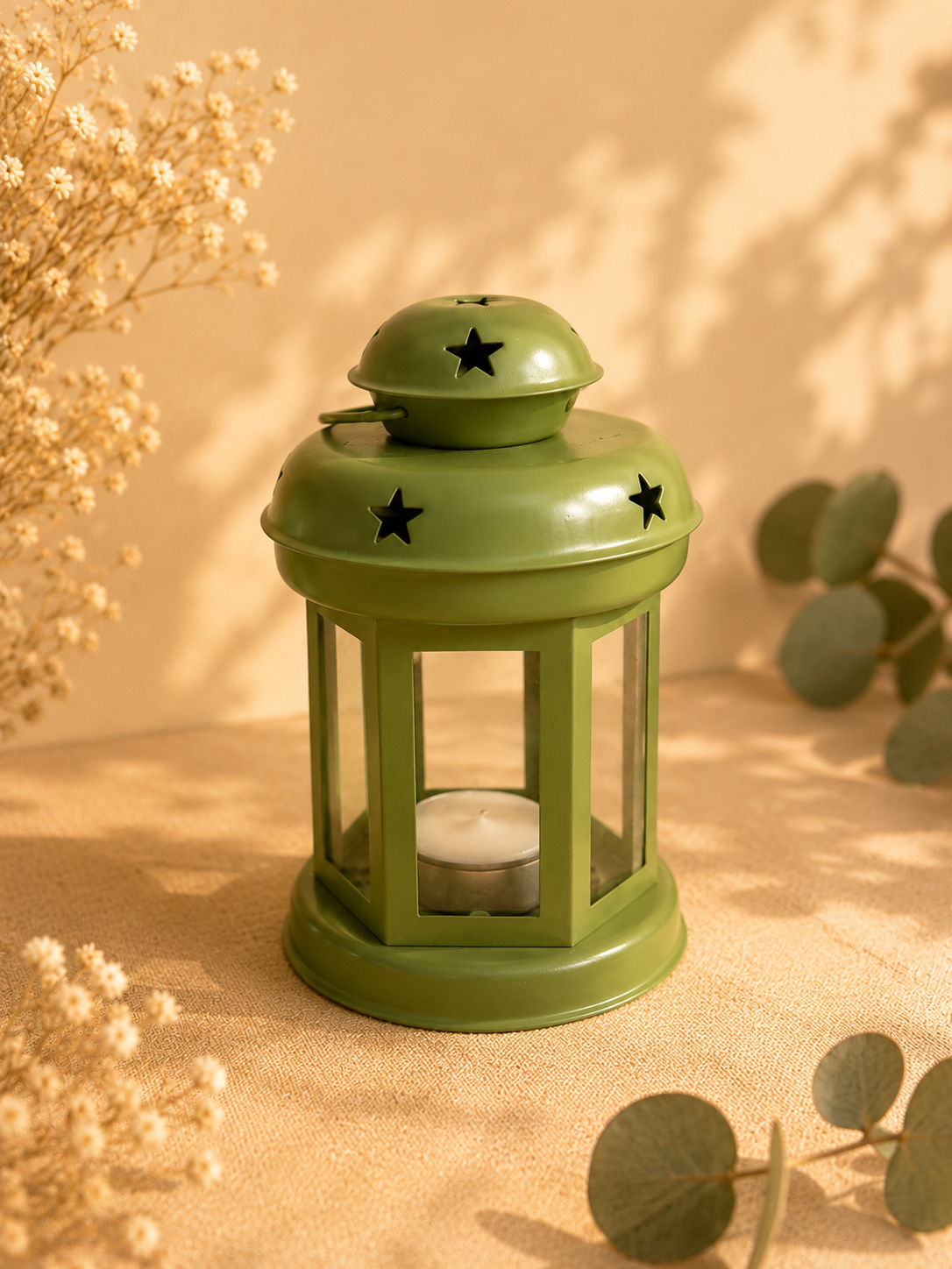 Lanterne décorative verte en location pour mariage, baptême et événements.

