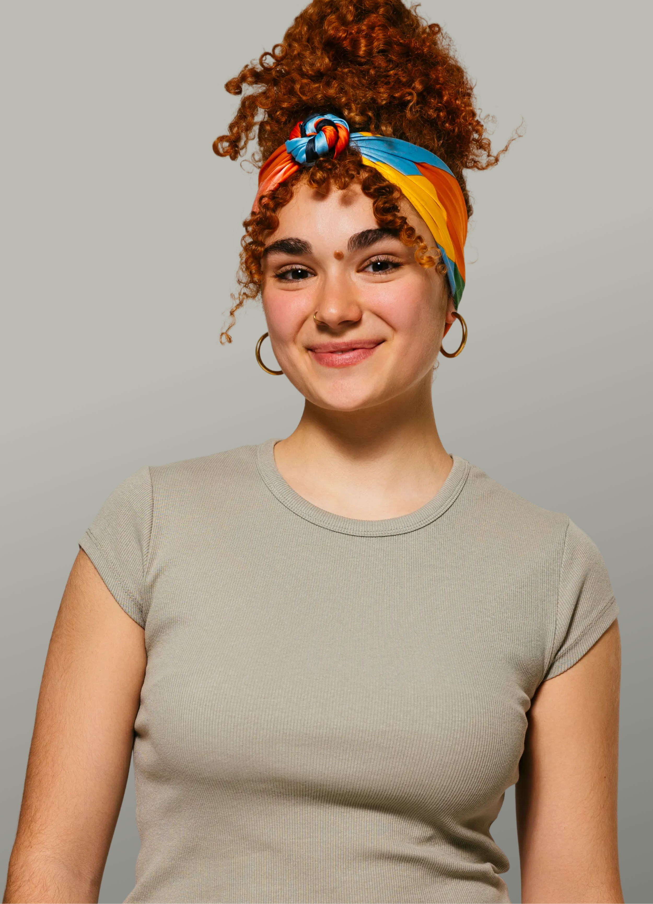 Portrait of a female tutor in a grey shirt