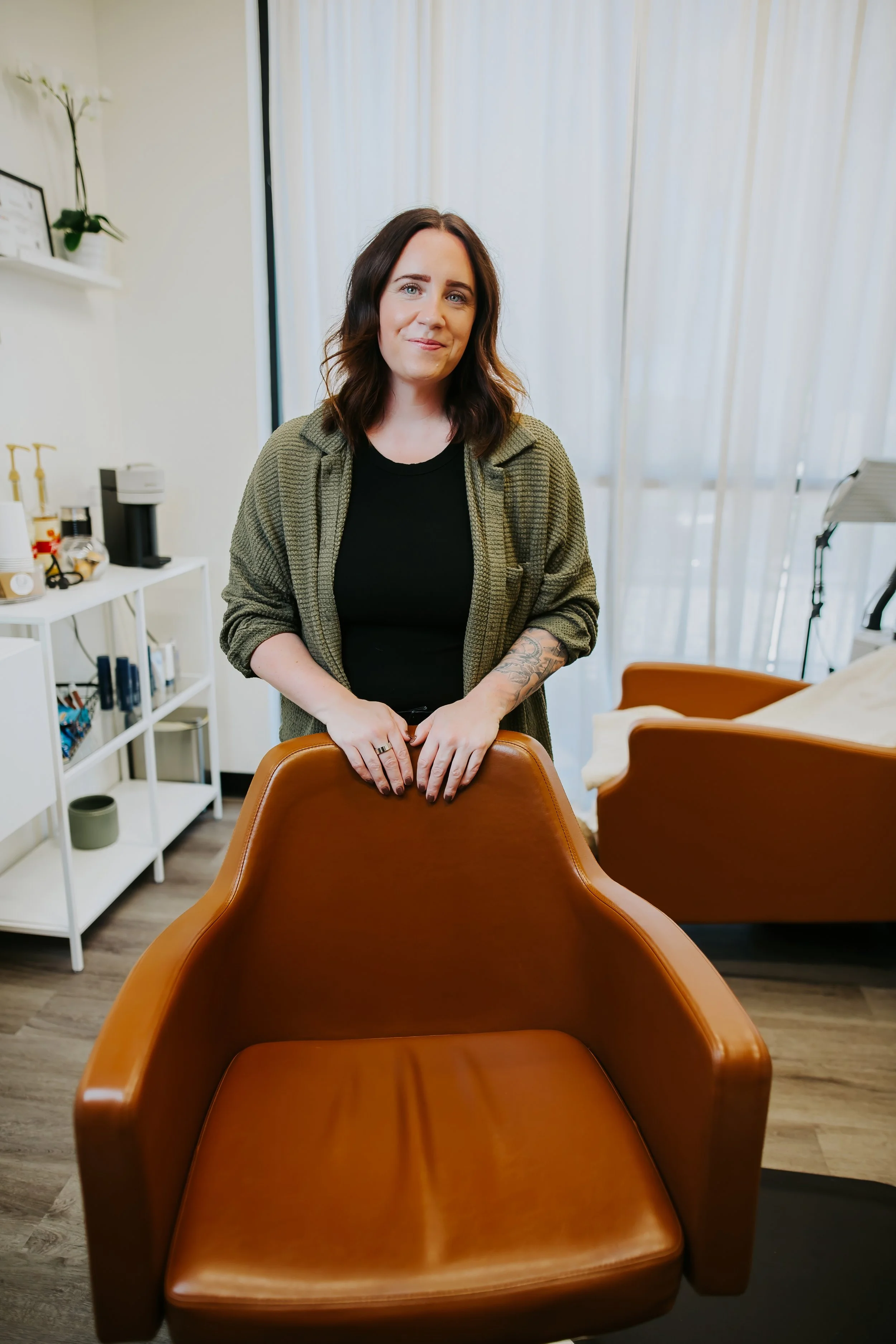 Hair loss specialist Sara Connors from Connors Collective Hair Studio standing in her private studio suite in the North Phoenix/Scottsdale area.