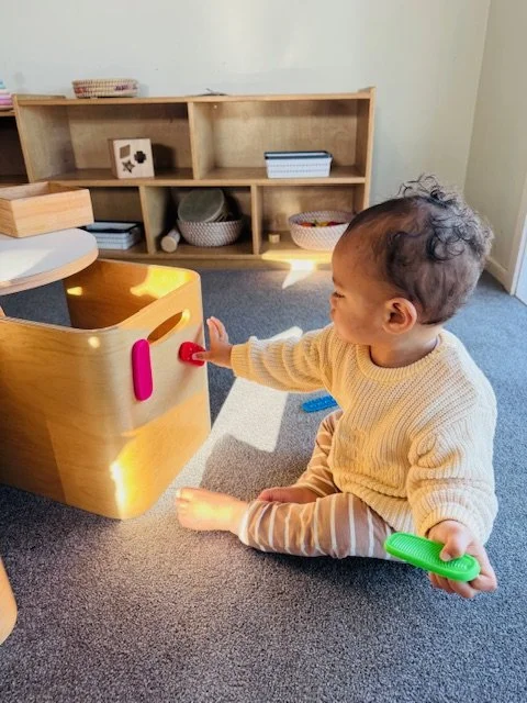 Child exploring magnetic resources through hands-on learning, developing creativity, problem-solving and fine motor skills.