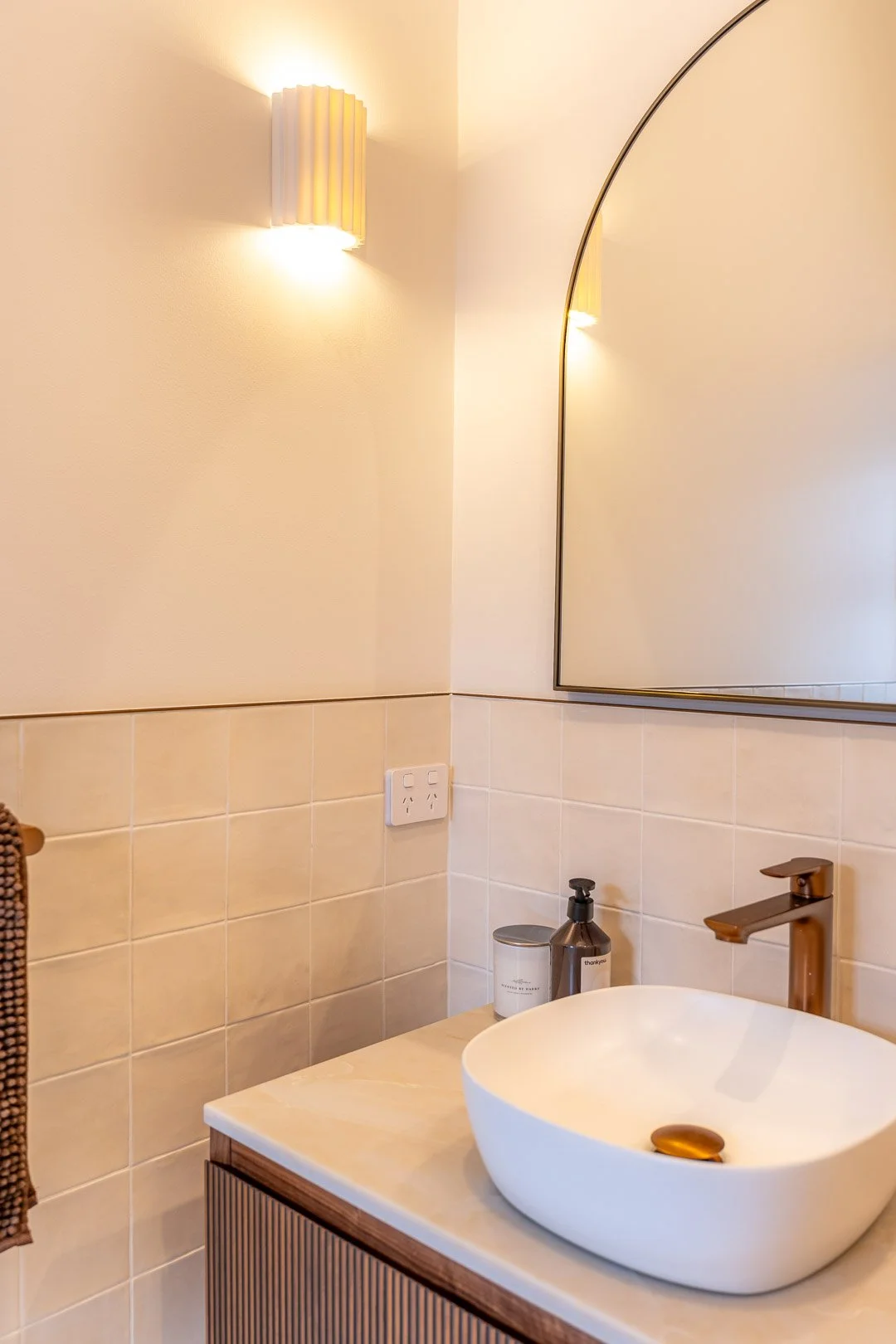 A designer bathroom with quality lighting and powerpoints