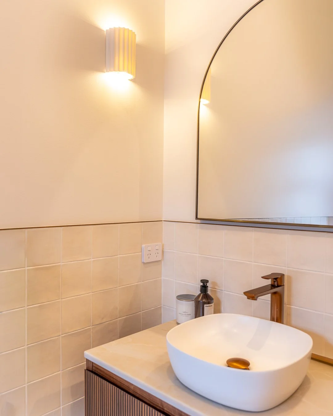 beautiful bathroom with tasteful lighting
