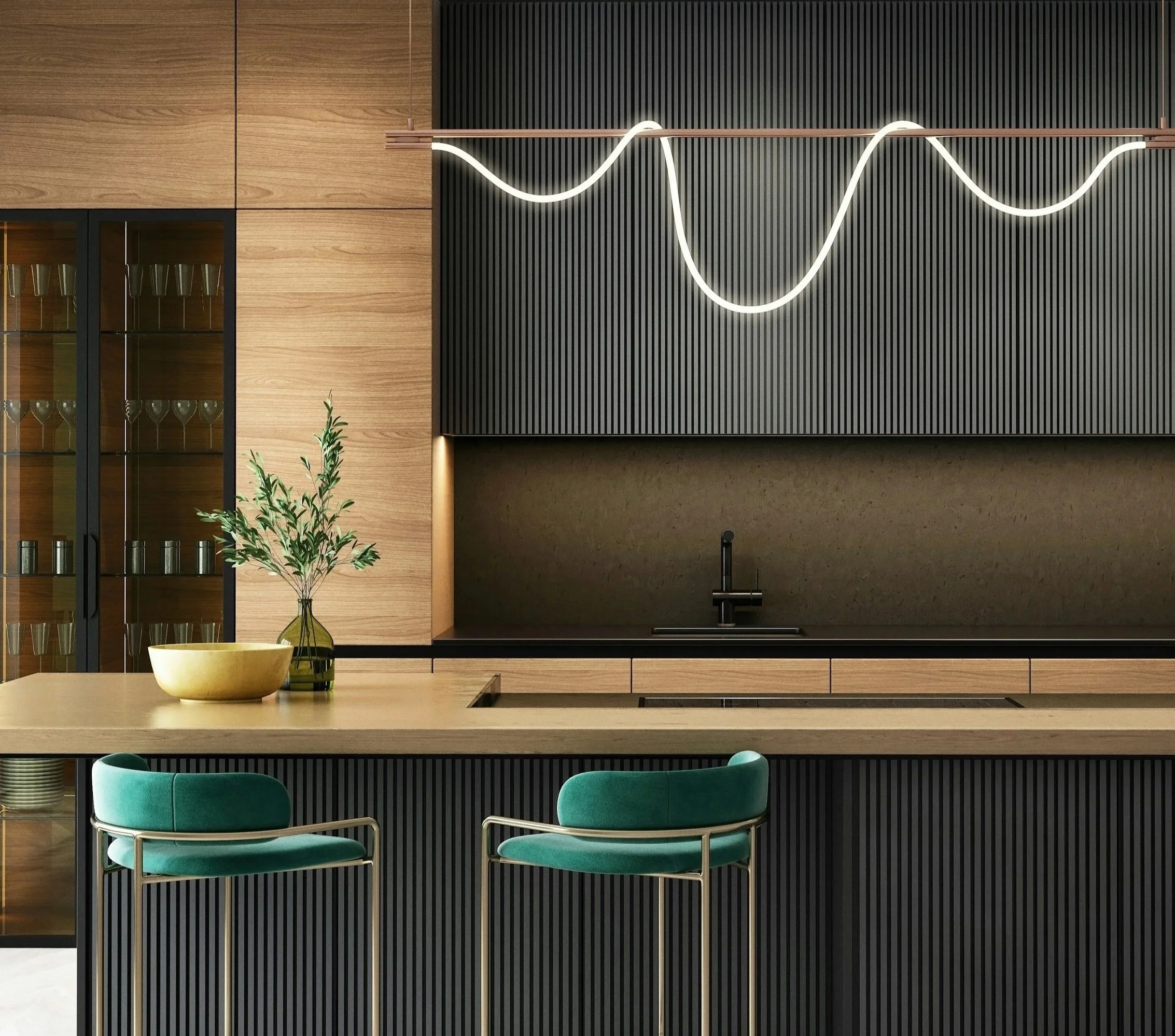 Modern interior design with black vertical slat wall, wood paneling, a sleek white wave-shaped light fixture, a display cabinet with glass doors and wine glasses, a green plant, a beige countertop with a yellow bowl and a green vase, and green chairs at a table.