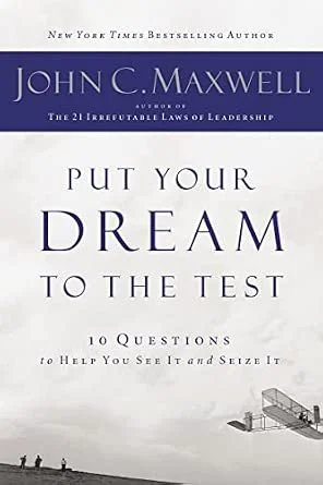 Book cover titled 'Put Your Dream to the Test' by John C. Maxwell, with subtitle '10 Questions to Help You See It and Seize It'.