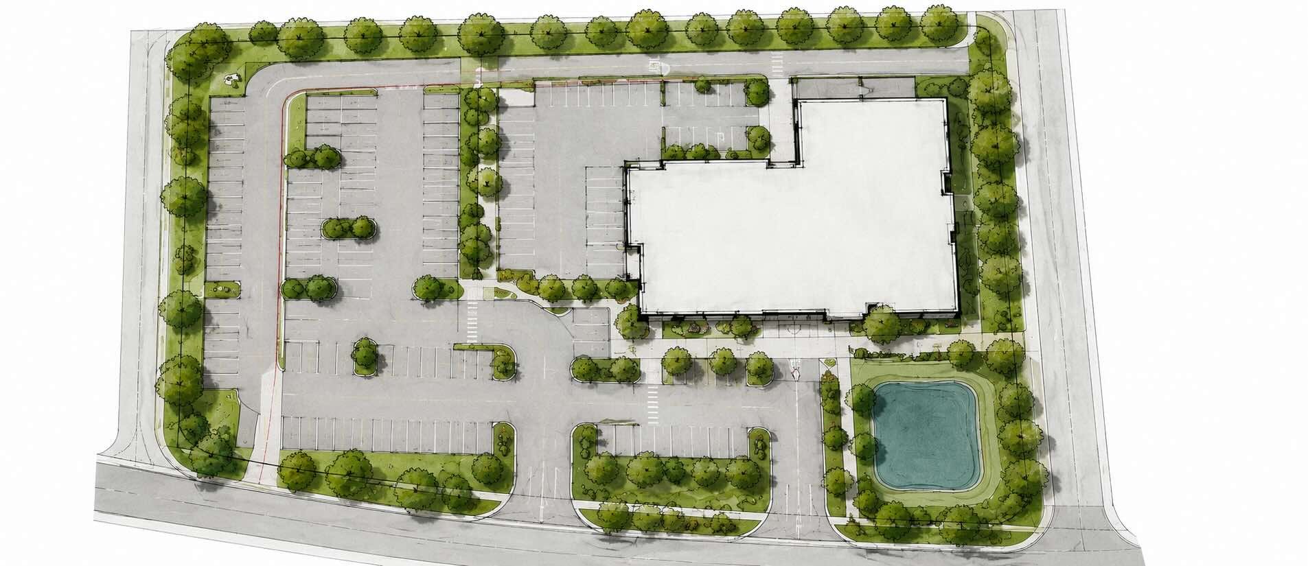 Preliminary site plan showing building placement, parking, landscaping, access routes, and a stormwater pond.