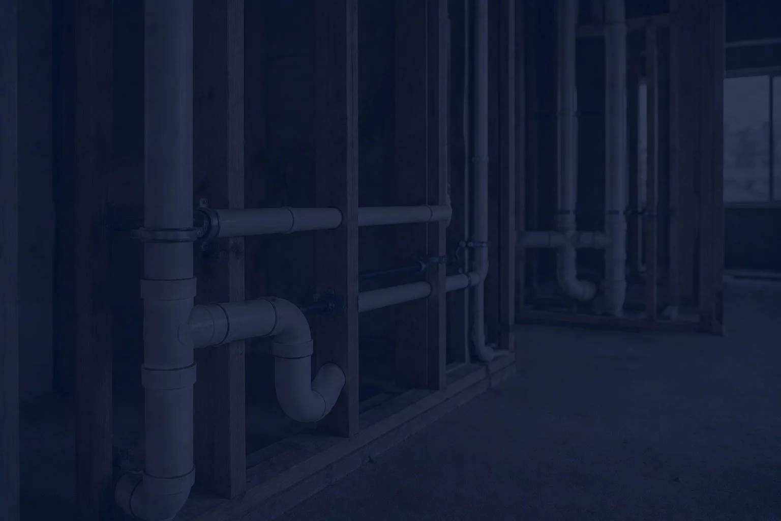 Plumbing pipes in wall