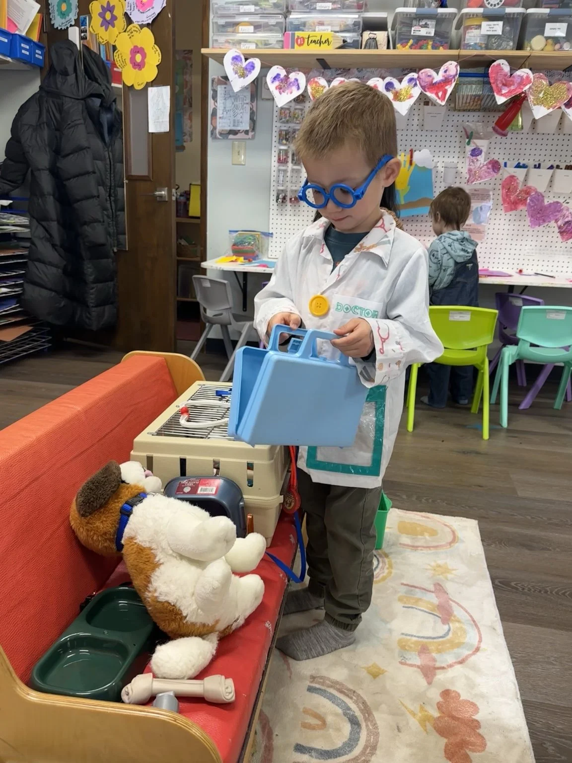 Child engaging in imaginative doctor-themed dramatic play.