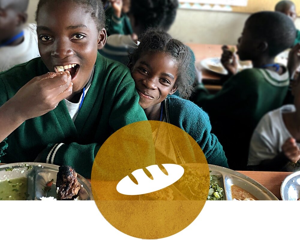 child-receives-food.jpg