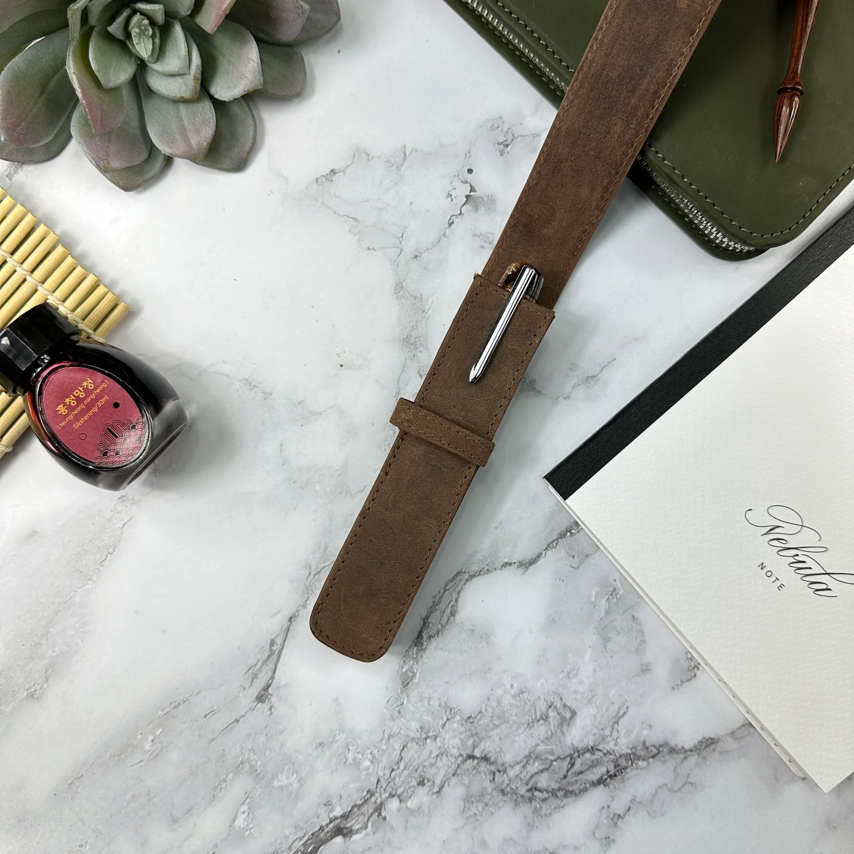 Pen case brown open.webp