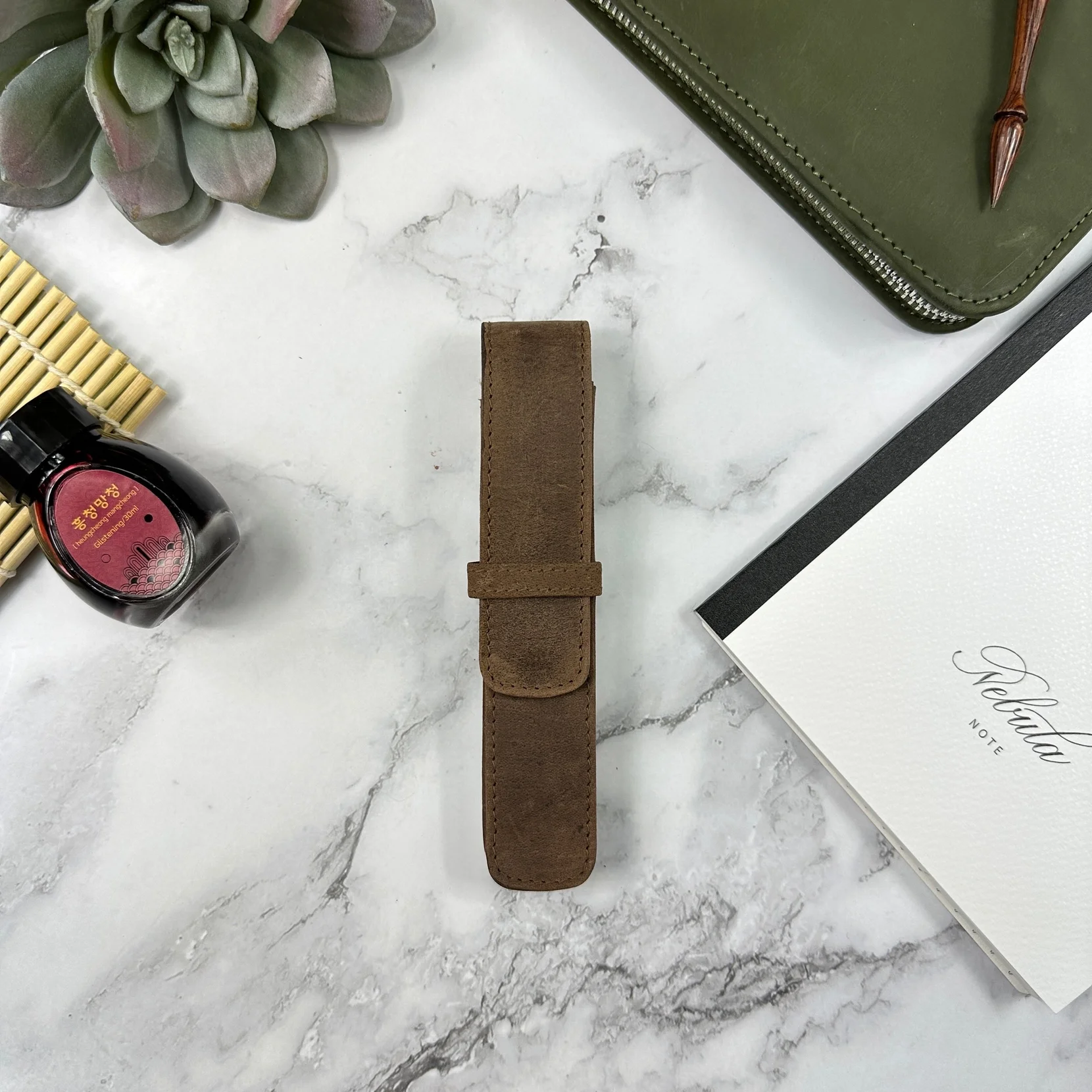 Pen case brown.webp